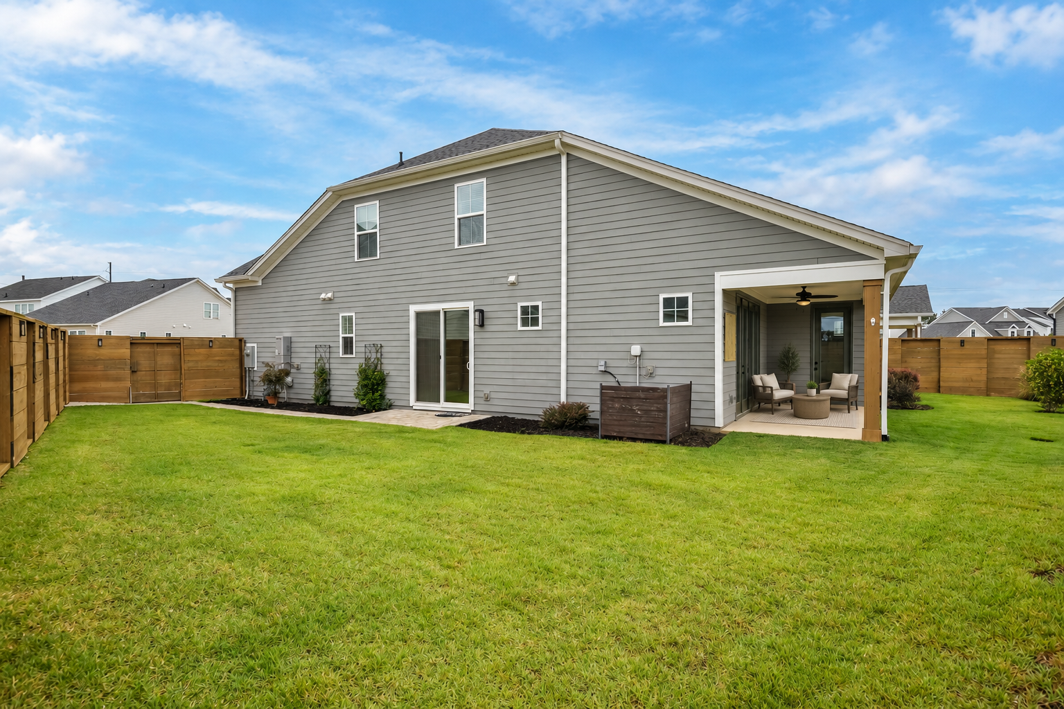 Cozy Covered Patio and Modern Backyard.png