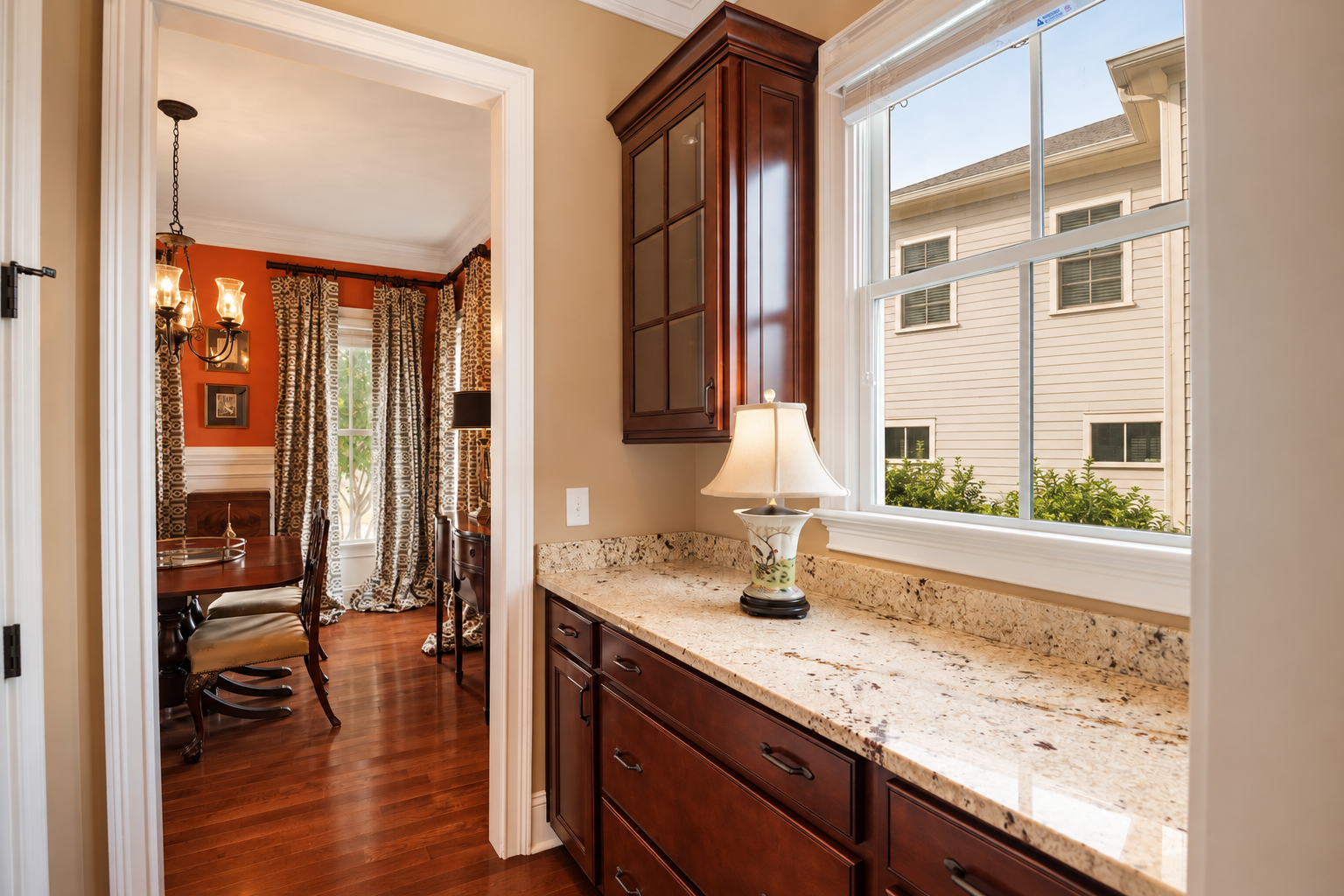 Warm Butler’s Pantry Overlooking Dining Room.png