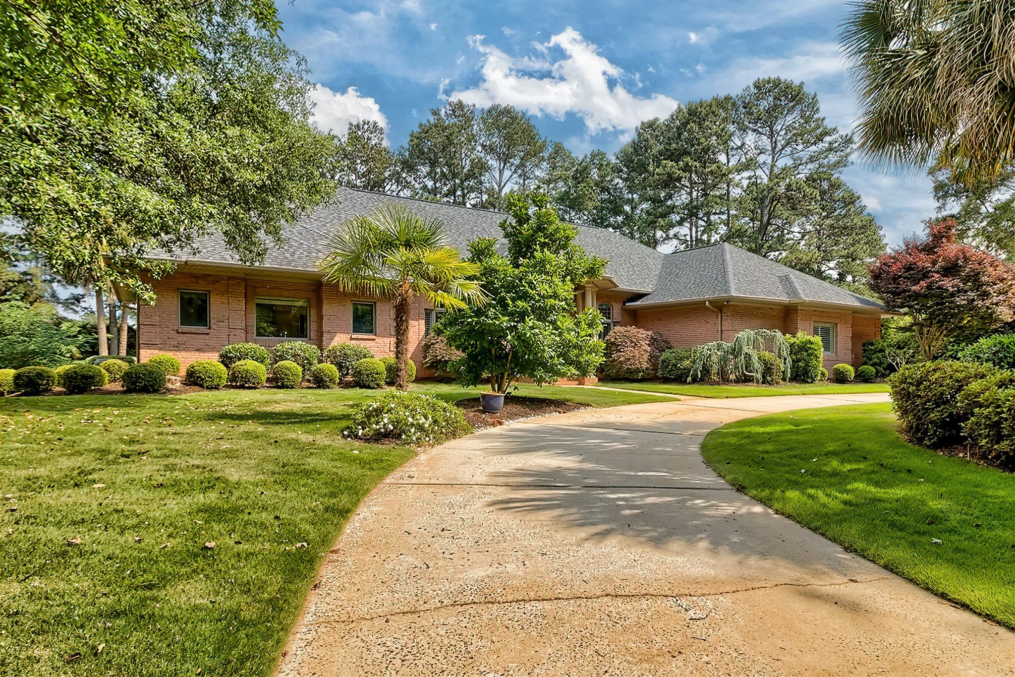 Brick home exterior and driveway in Spence Plantation on Lake Murray near Lexington SC