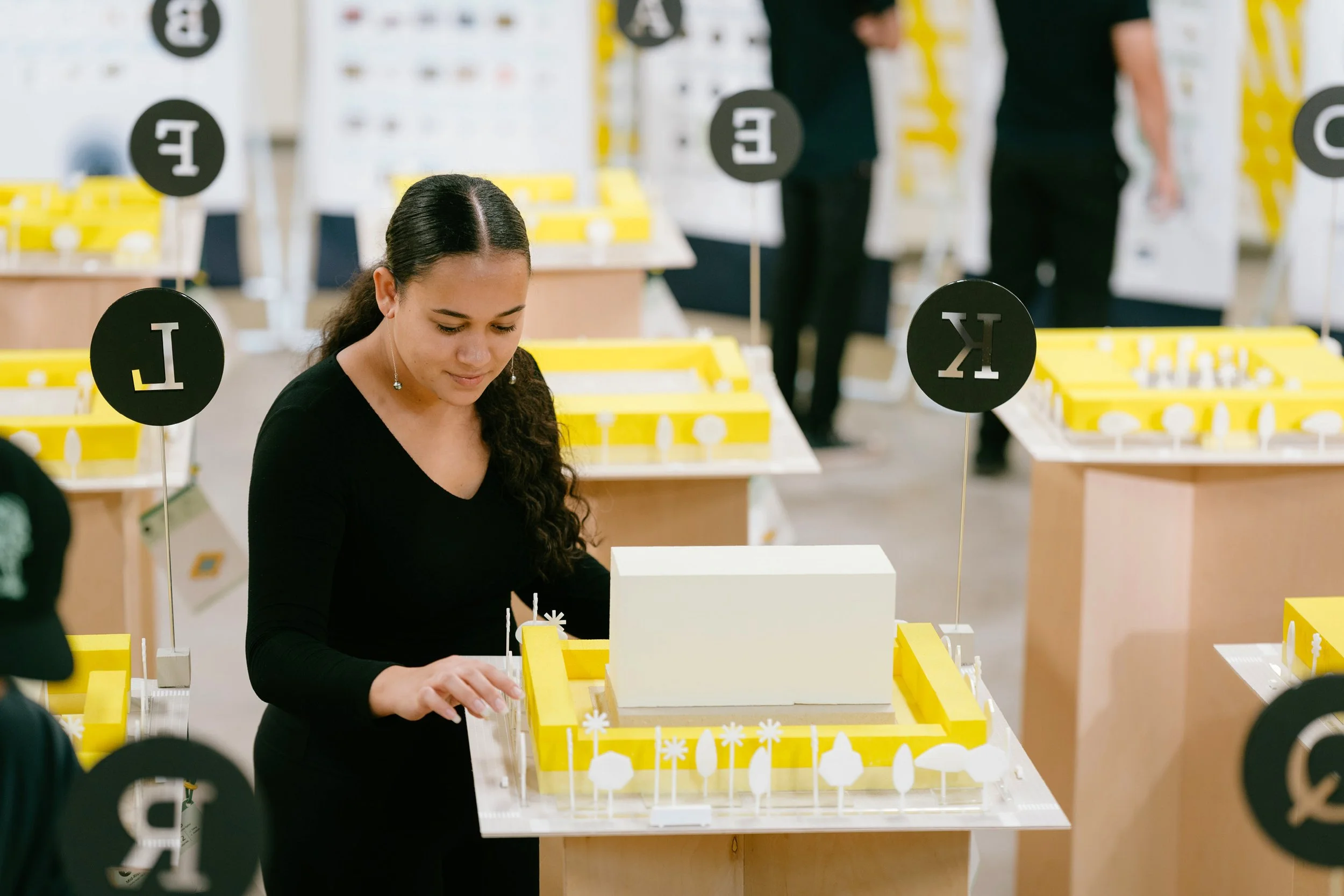 Density Alphabet exhibition showing architectural models of 26 housing variations