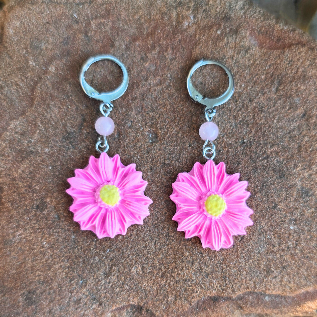 pink daisy earrings.png