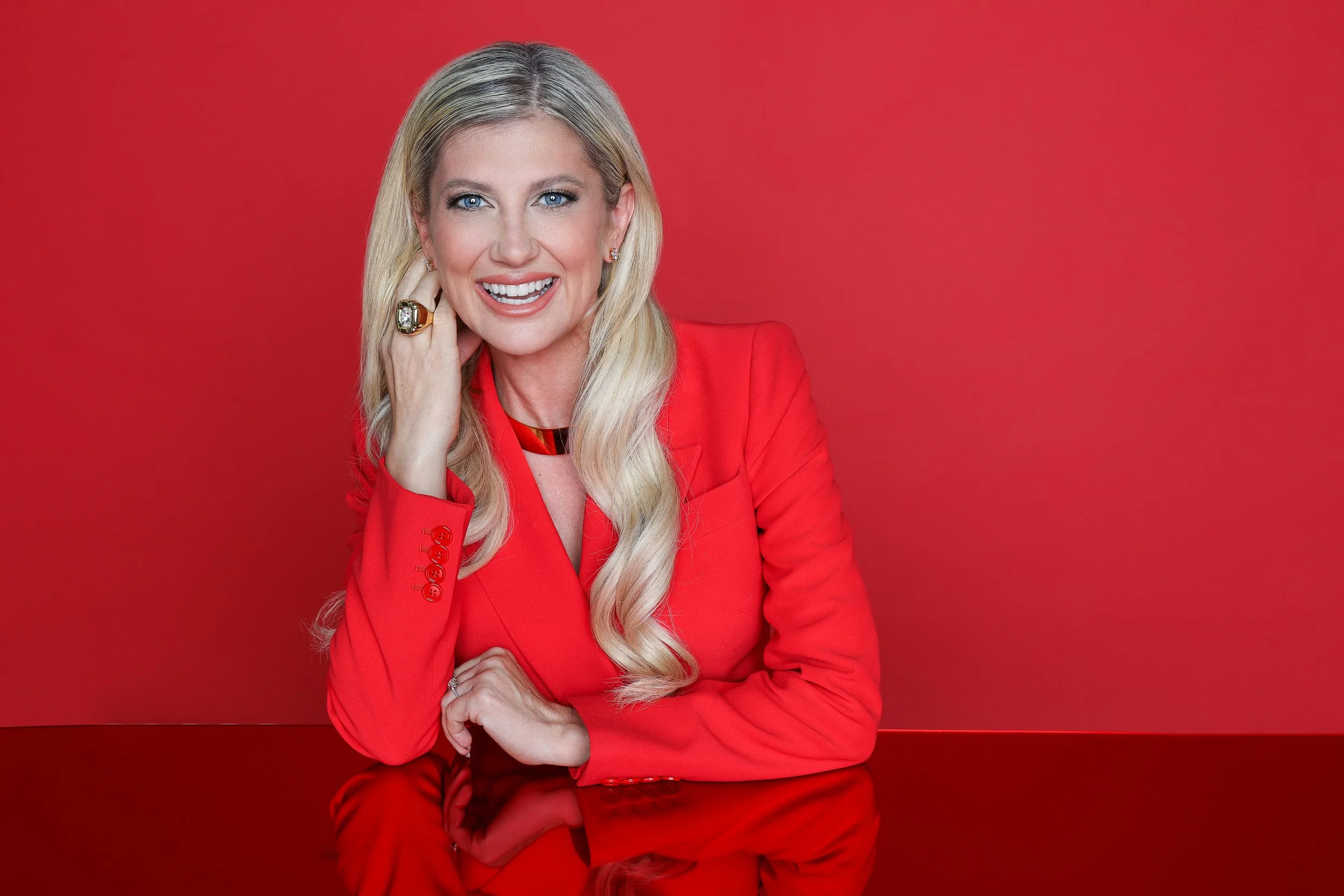 Author headshot with timeless styling and approachable expression