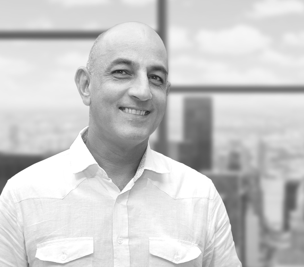PREM BHATIA, Managing Director, Asia