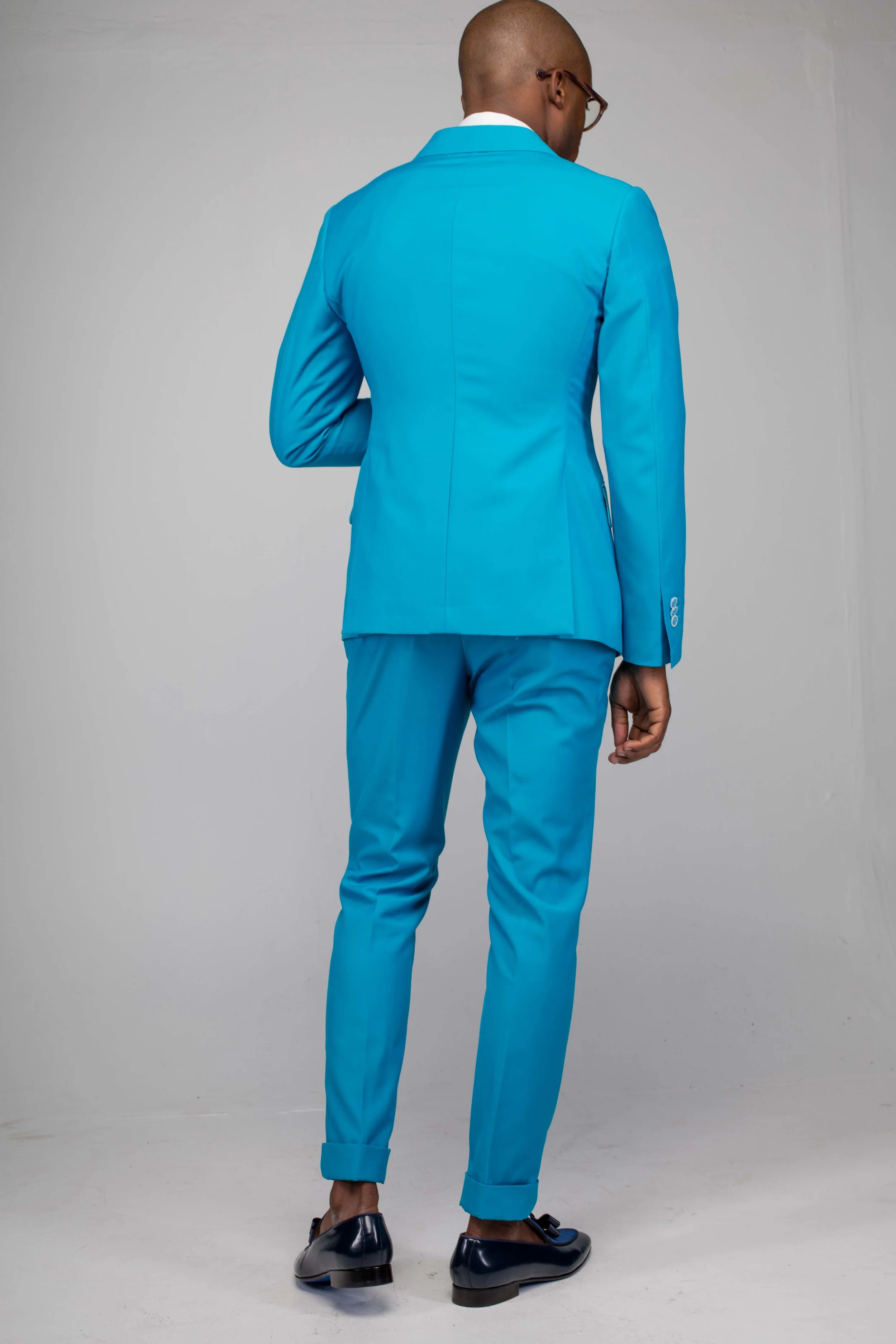 teal double breasted suit