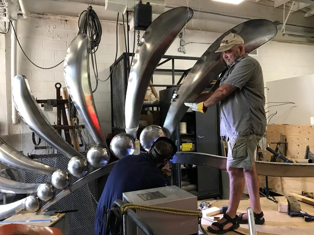 welding the feather.jpeg