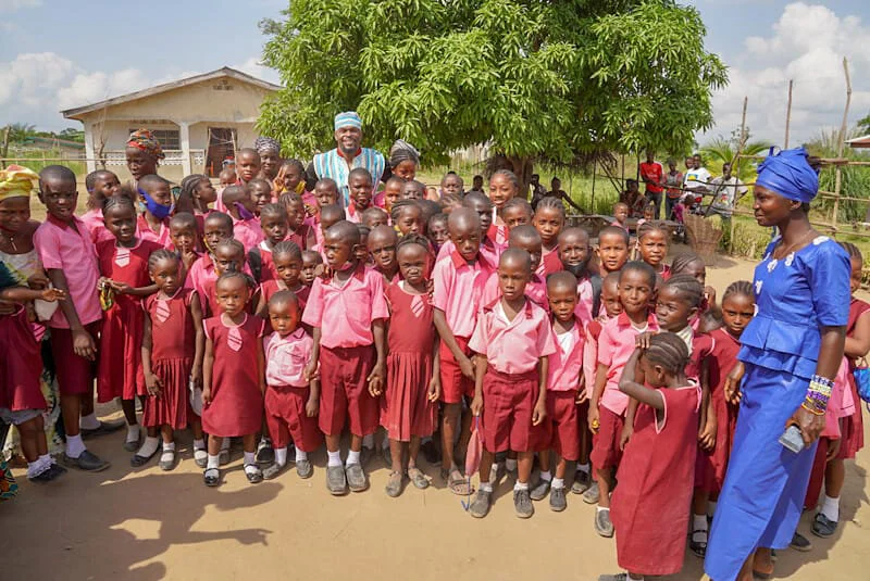 Dynast Amir with students at The Chuck Brammer School in Bo, Sierra Leone
