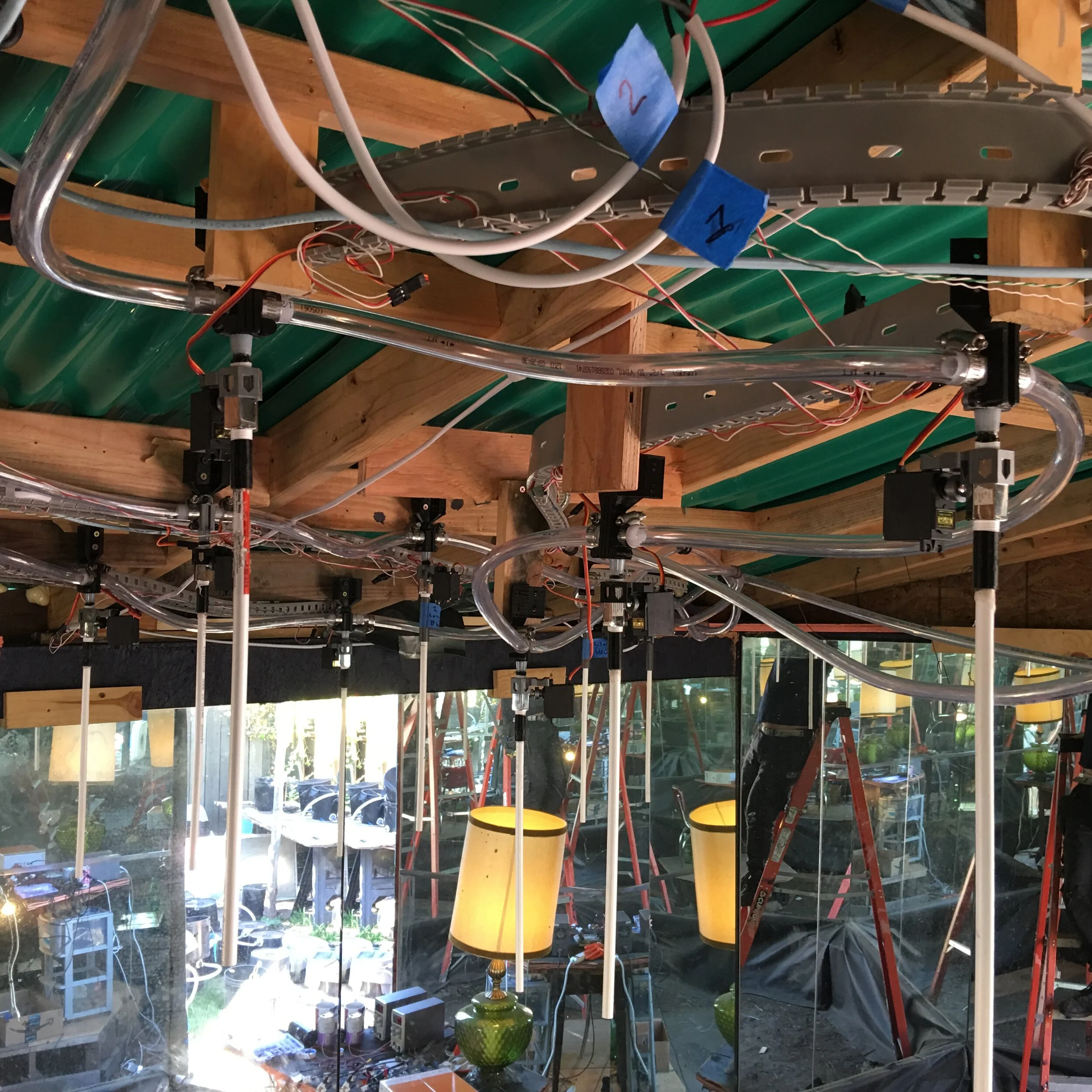 Rain emitters with tubing for water flow