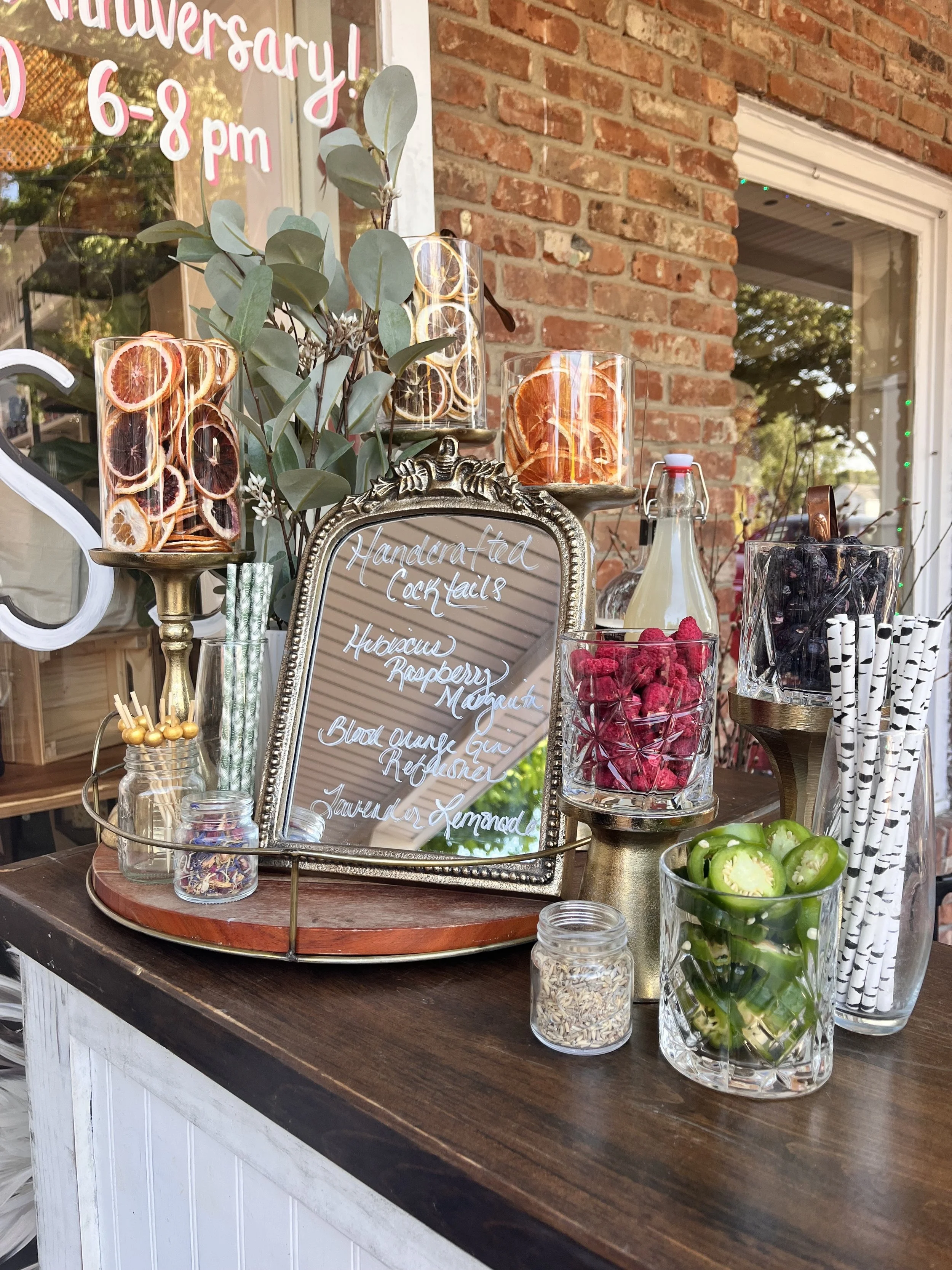Portable cocktail bar setup by HandleBar Services featuring handcrafted drinks for weddings and private events.