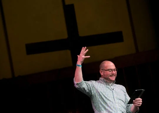 A week after the Camp Fire burned through the town of Paradise killing at least 84 and displacing thousands, Pastor Ron Zimmer holds a Sunday service at the East Avenue Church in Chico, California, on Nov. 18, 2018. By the morning after the fire Pastor Zimmer had opened his church to the displaced and evacuated, becoming a pop-up shelter with a volunteer-run medical facility. (Photo: Thomas Hawthorne/USA TODAY NETWORK)