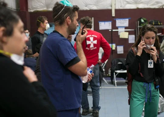 Volunteer medical staff work in the East Avenue Church Shelter in Chico, California, on Nov. 17, 2018. (Photo: Thomas Hawthorne/USA TODAY NETWORK)