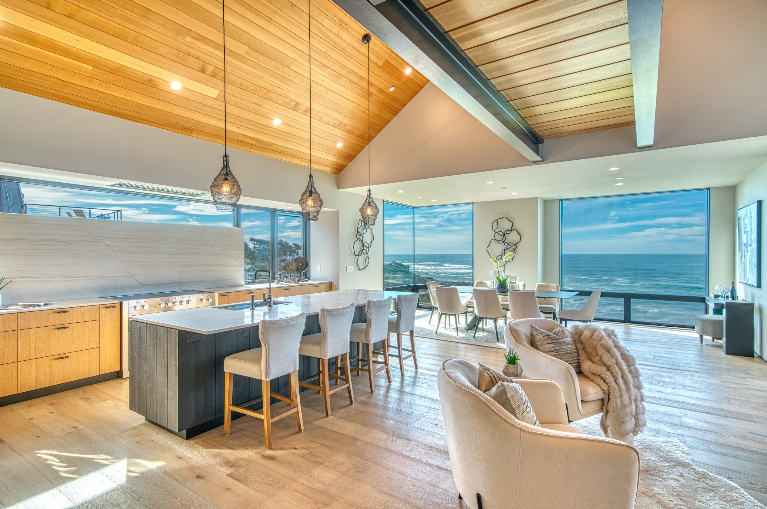 11-kitchen-breakfast-bar-pendant-lights-ocean-views.jpg