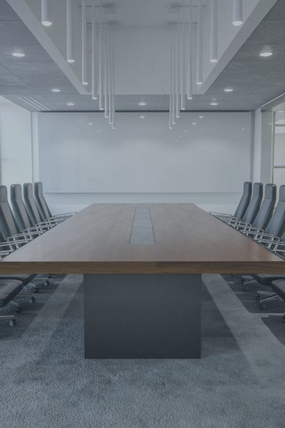 An empty boardroom showcasing Cybersecurity Concerns are Paramount Among Executives in Almost All Roles, Regions, and Industries