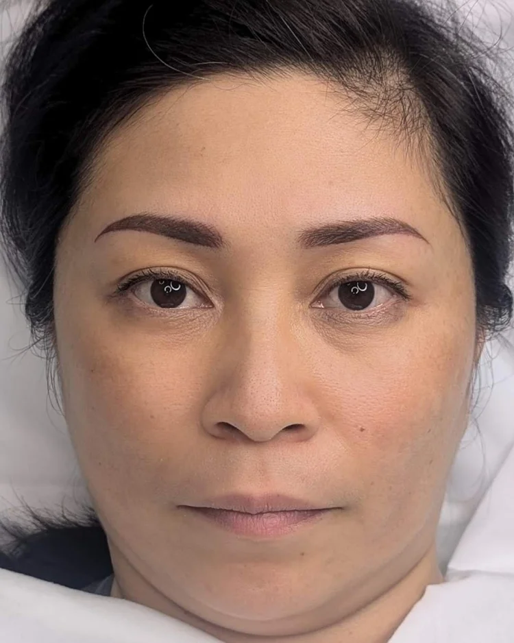 After hybrid brow treatment — natural beautiful eyebrows on tan skin tone — Le Kitsuné NYC