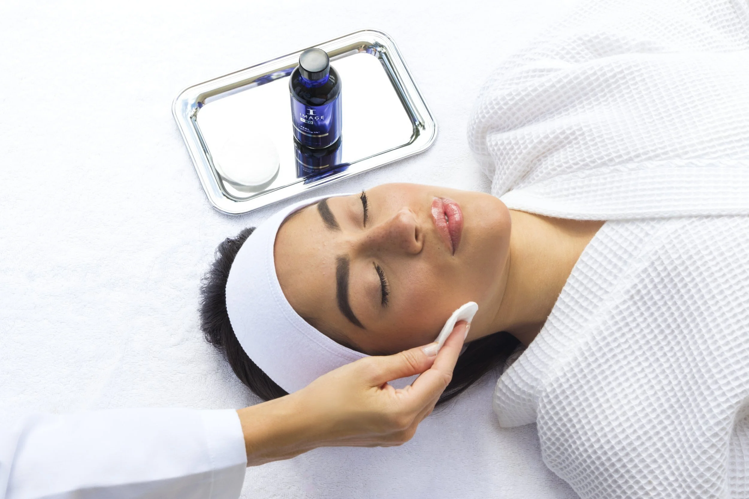 woman receiving chemical peel 