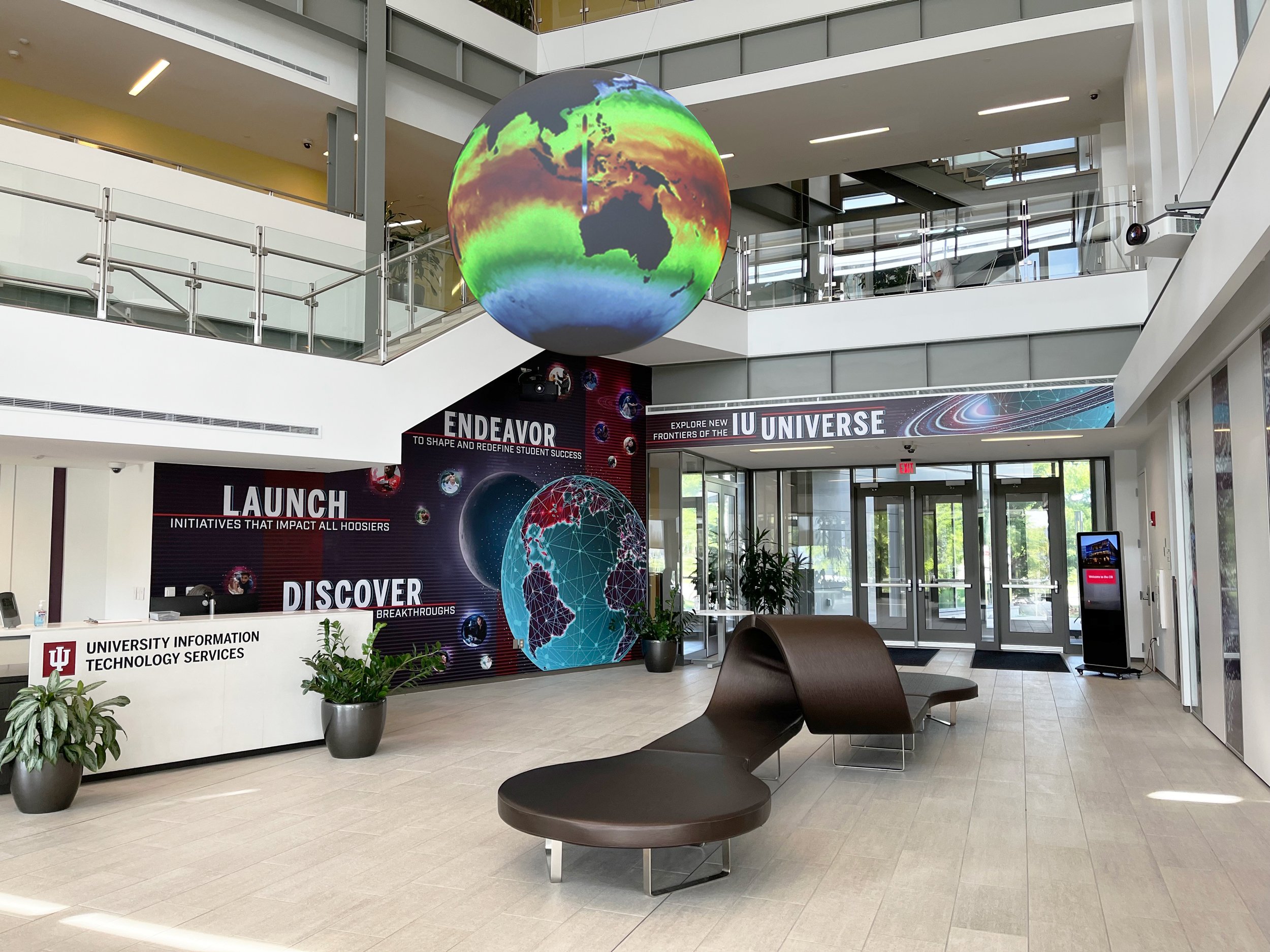 IU's CIB lobby with mural and Science on a Sphere