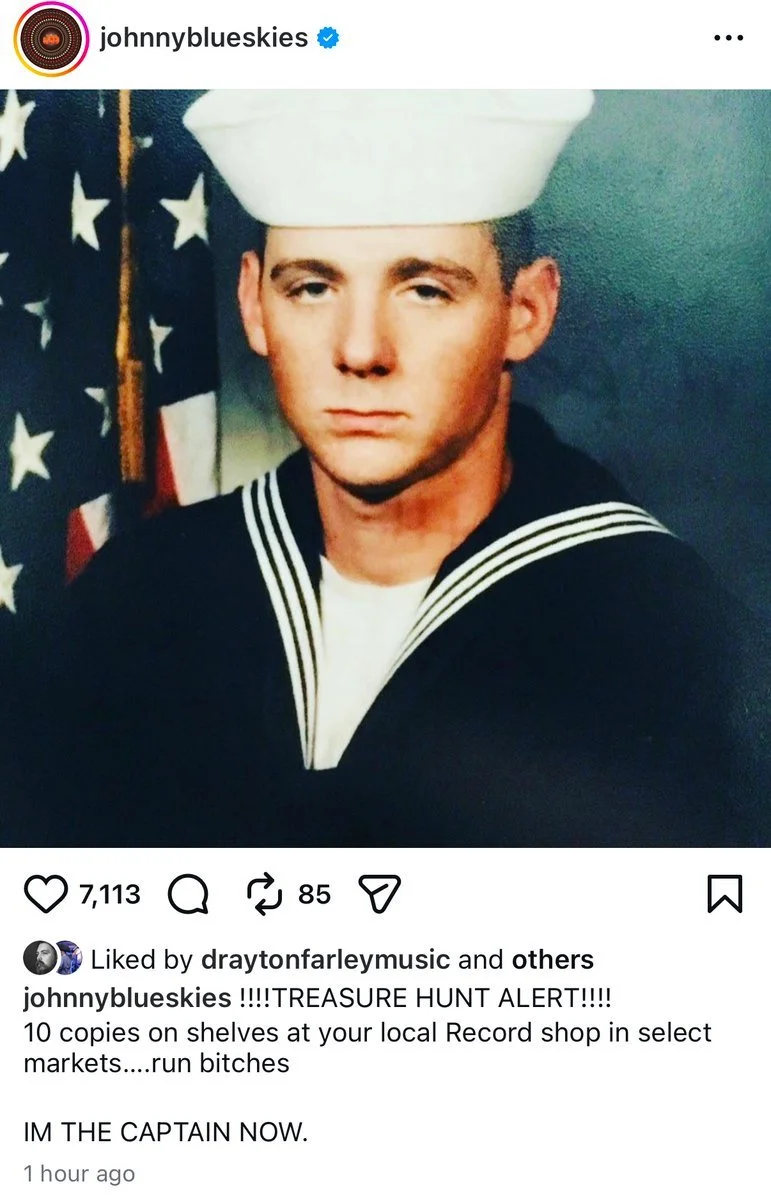 Instagram post from Johnny Blue Skies announcing a treasure hunt for copies of Mutiny After Midnight available pre-release at ten select record stores