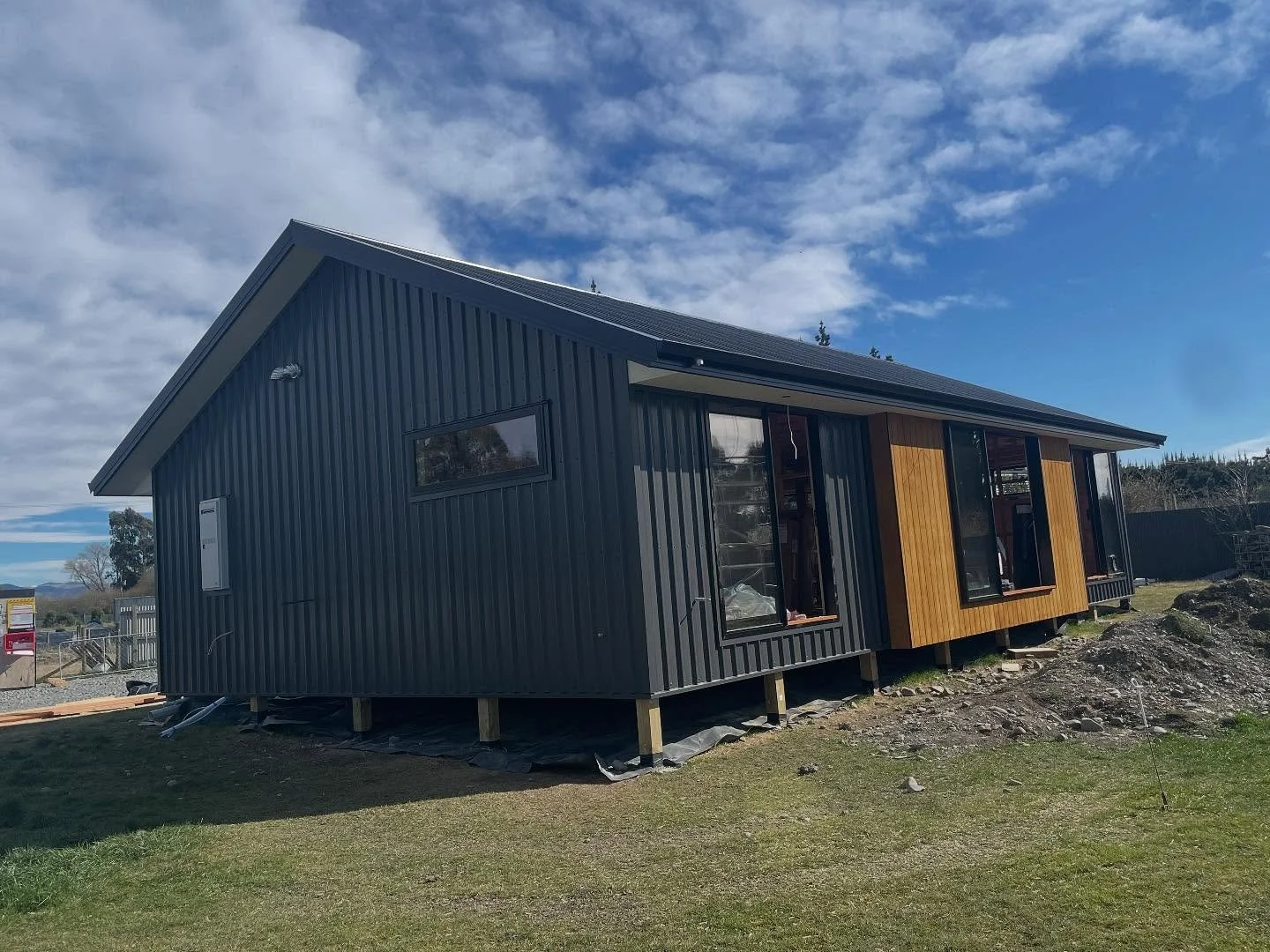 Mitch has been busy. Colour steel 5 rib cladding with grooved shadow cladding. π€©