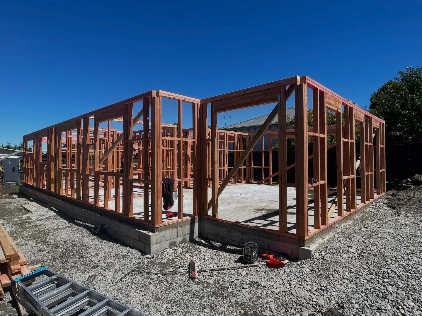 Timber framing is now fully installed and braced, with scaffolding erected and certified safety nets in place.

The structure is plumb, straight, and ready for the next stage &mdash; roof framing and roofing installation.
Site safety and access are s