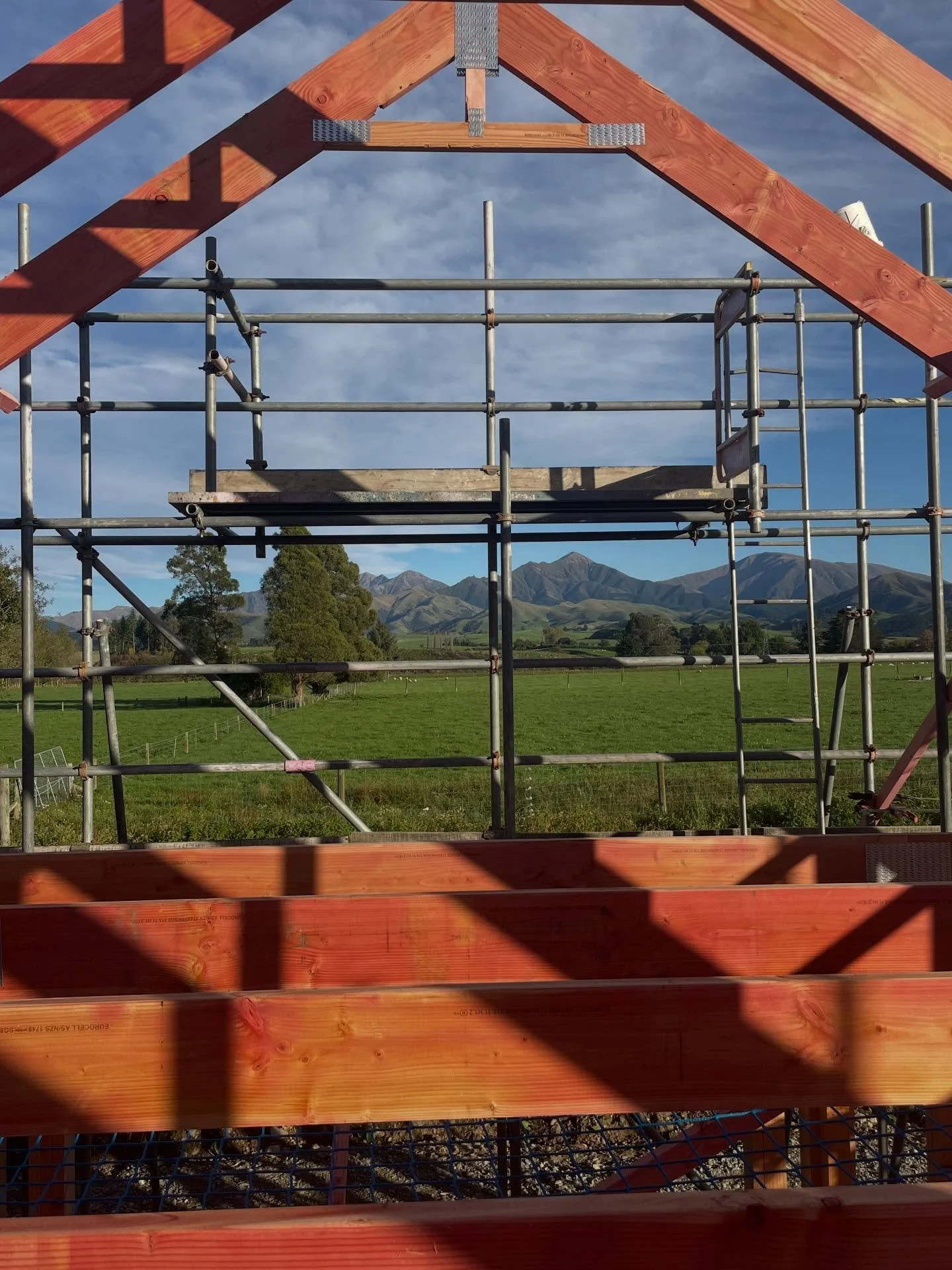 Fun in the sun for Easter Friday. Building our new shed home loving the view up stairs of the mountains. 🏔️