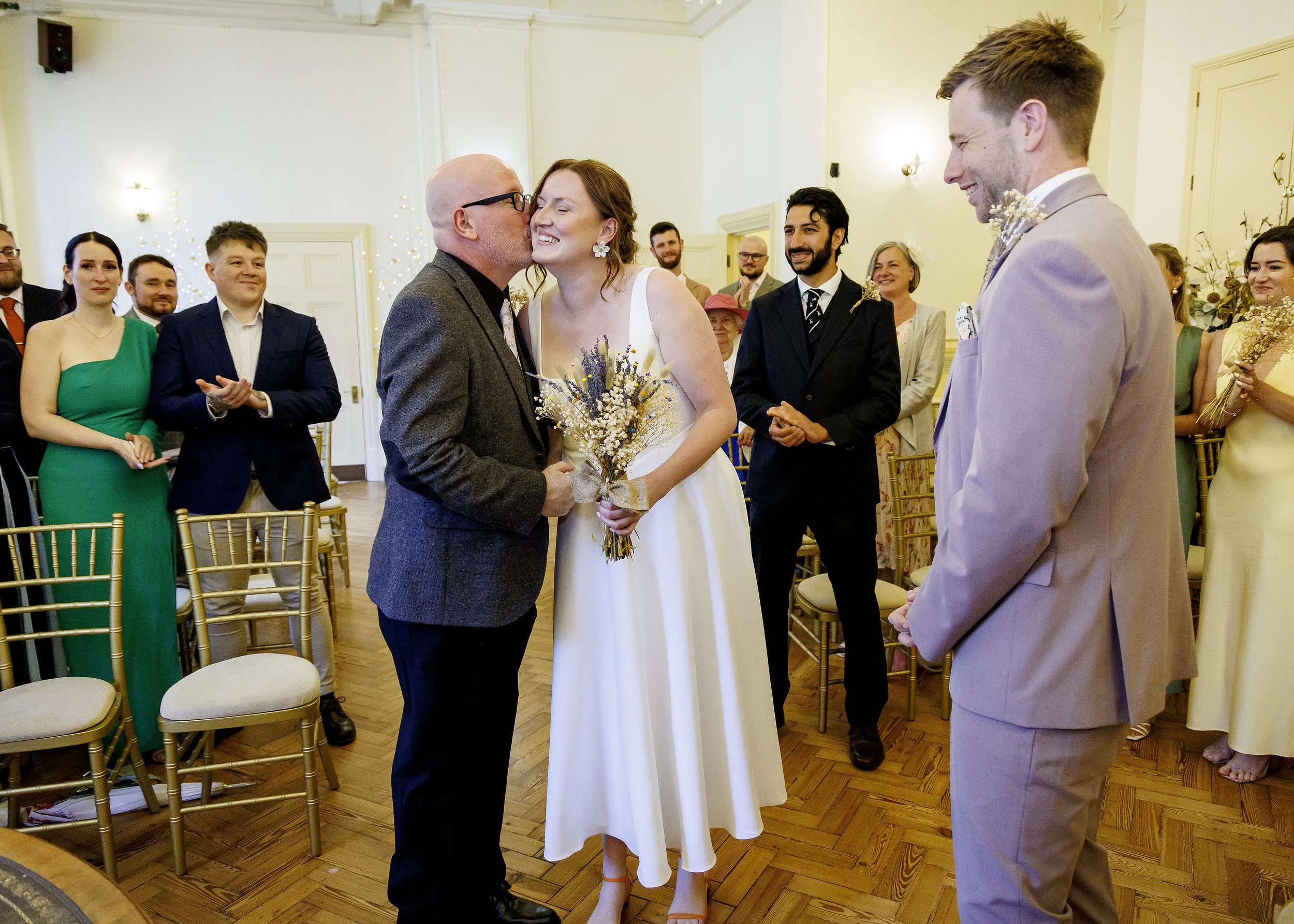 Emotional moment at a wedding ceremony in the Regency Room at Brighton Town Hall - East Sussex Wedding Photography