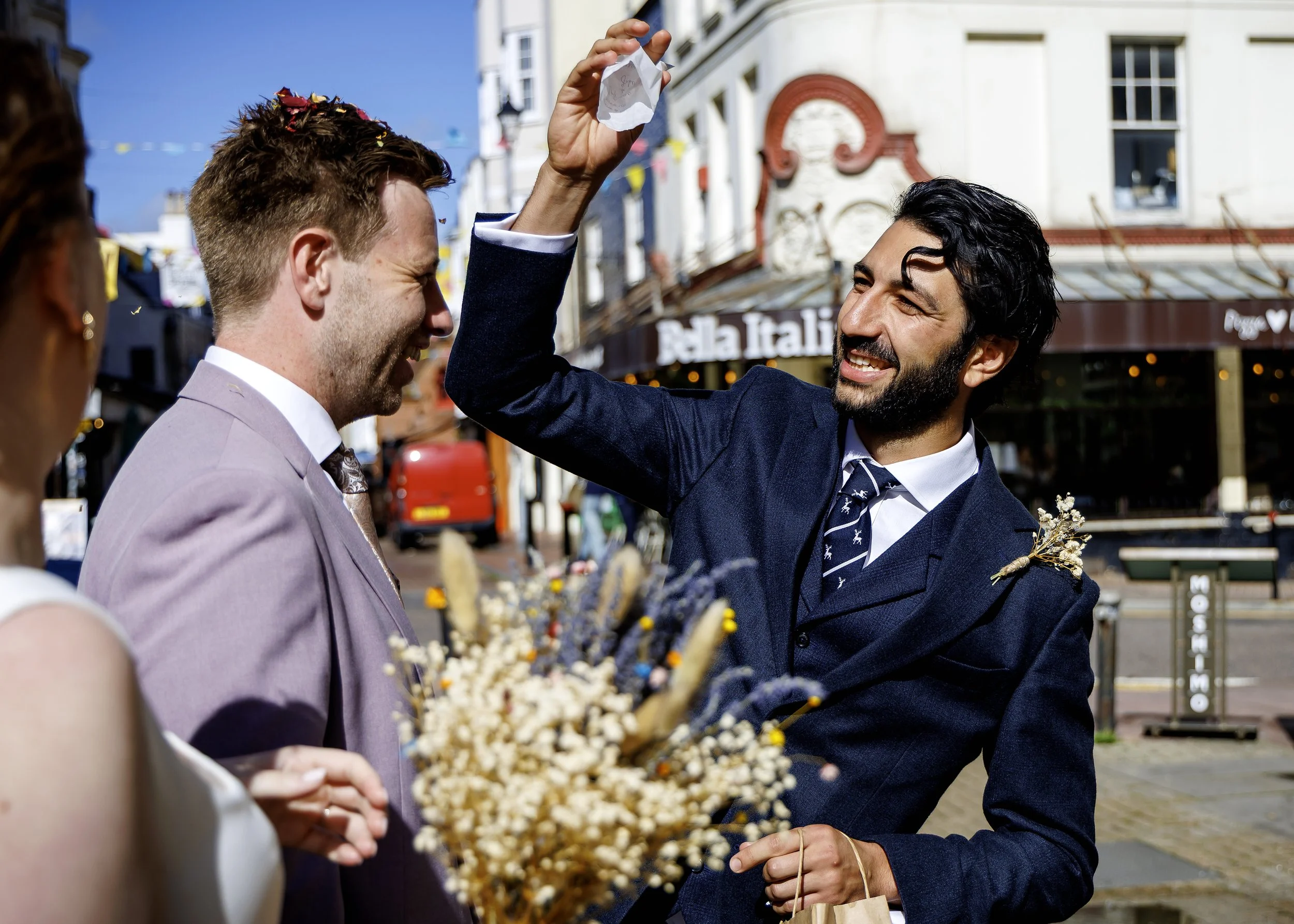 Sun-drenched wedding confetti on the steps of Brighton Town Hall - East Sussex