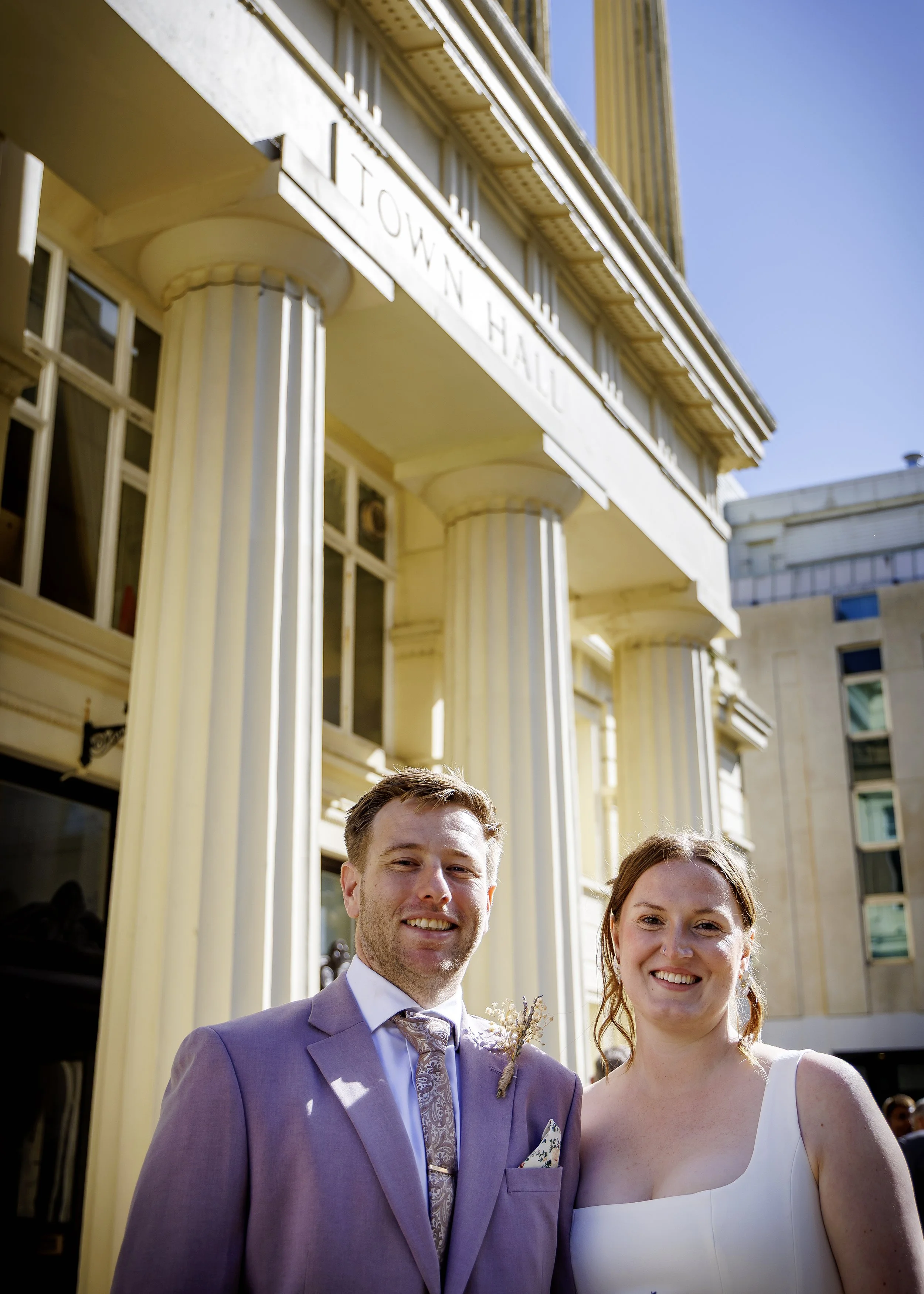 Natural wedding photography at the entrance of Brighton Registry Office - East Sussex Wedding Photography