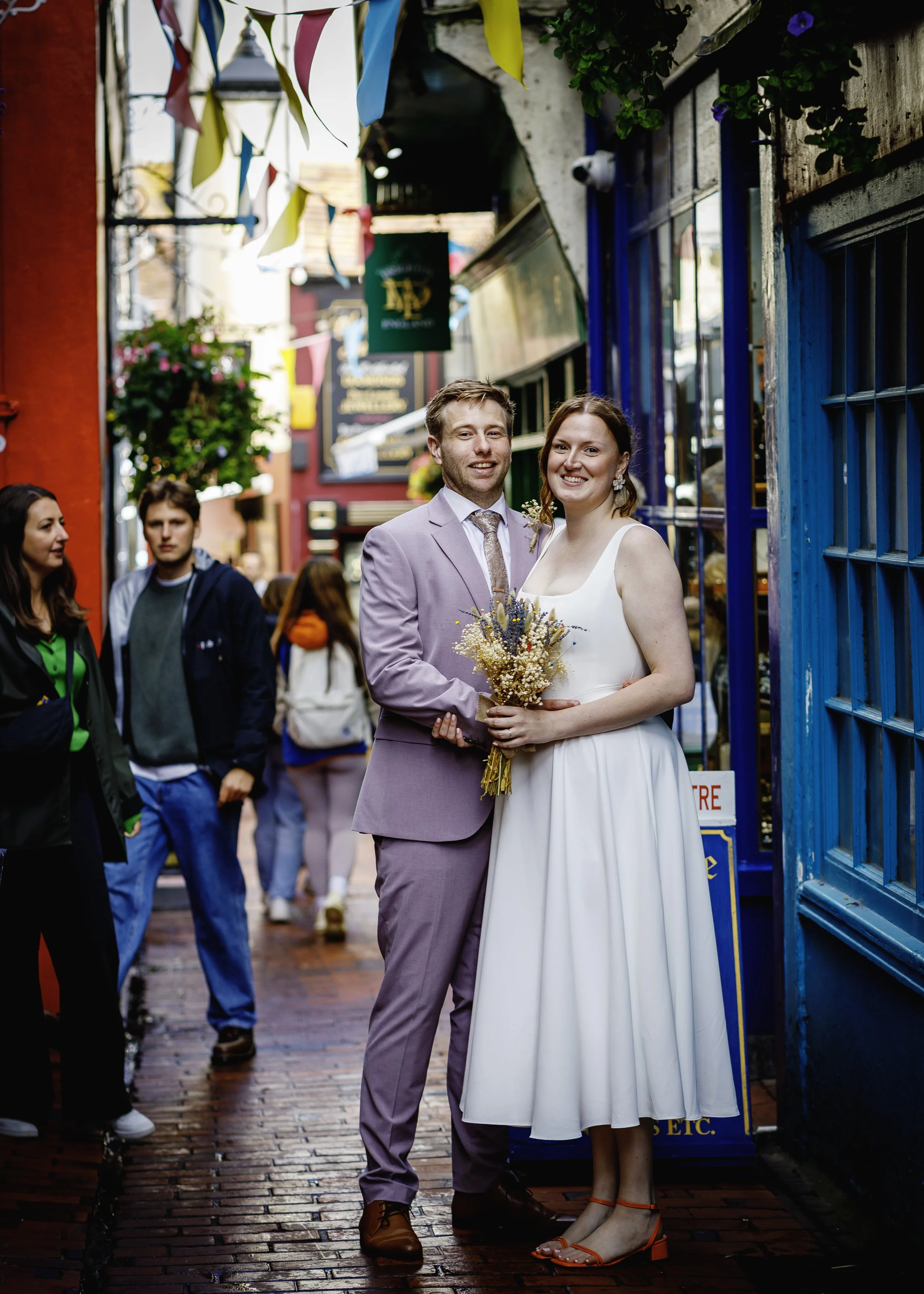 Relaxed couple portraits in the colourful Brighton Lanes after the ceremony - East Sussex Wedding Photography