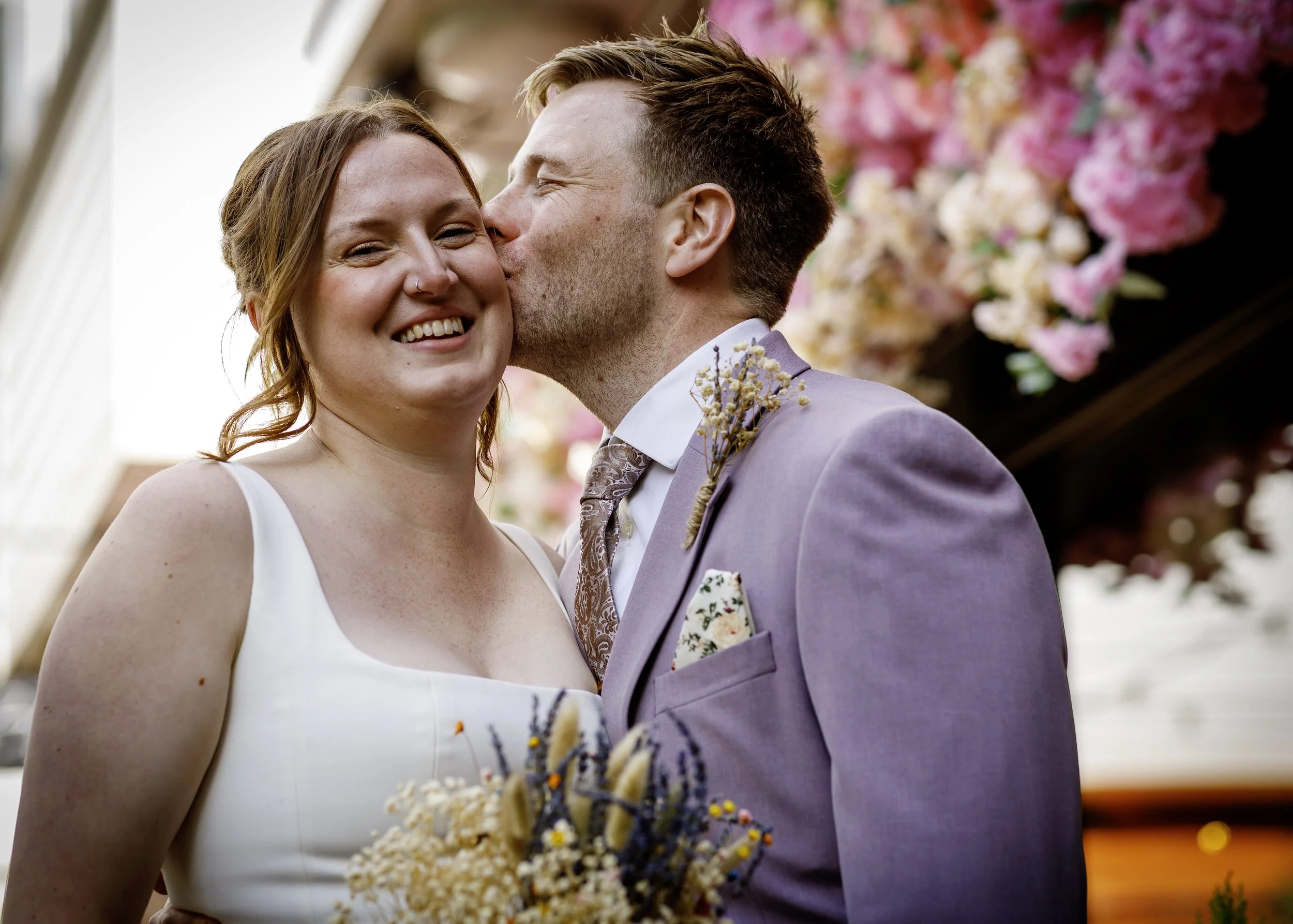 Relaxed couple portraits in the colourful Brighton Lanes after the ceremony - East Sussex Wedding Photography