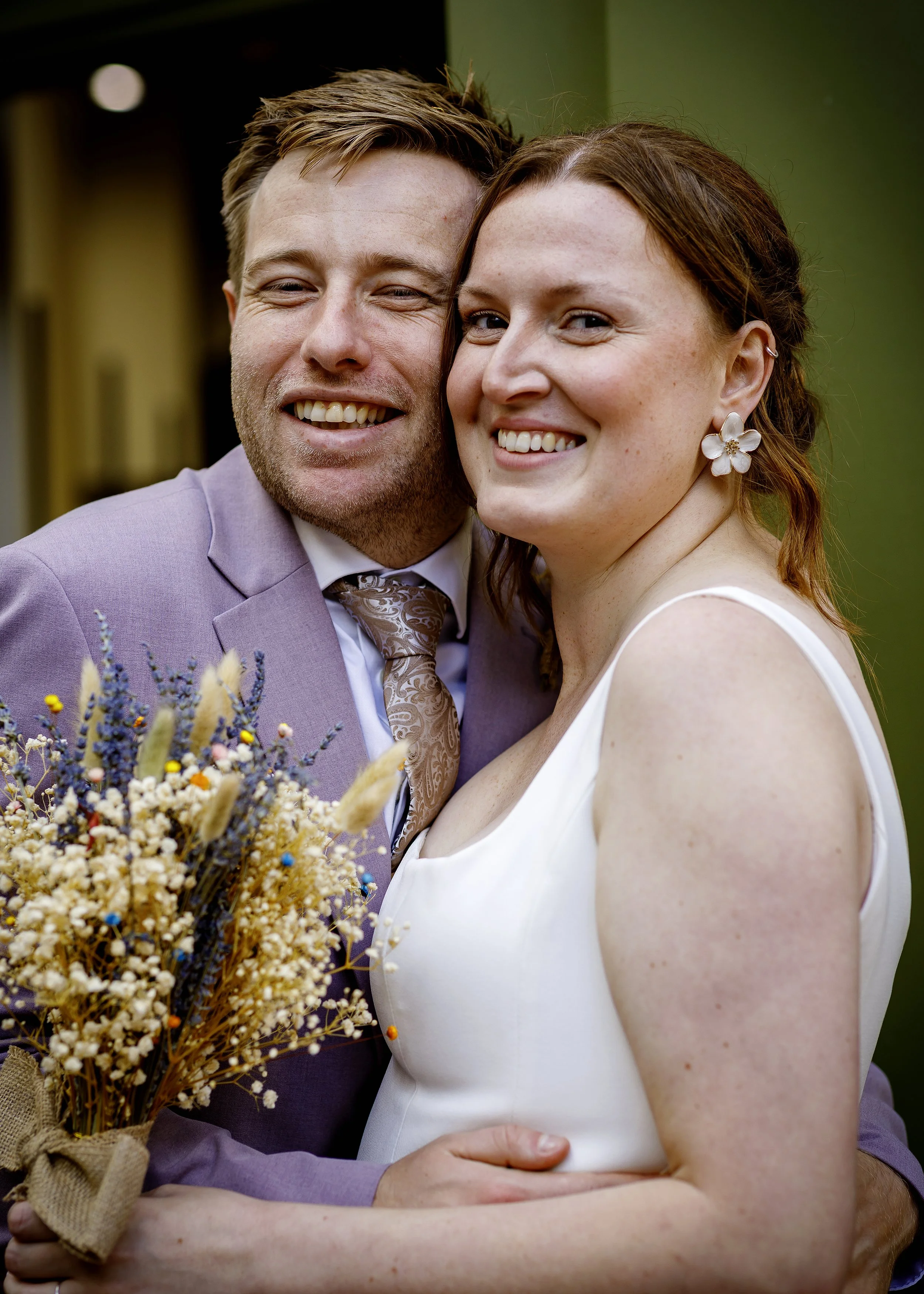 Candid portrait of a newly married couple in the heart of Brighton city centre