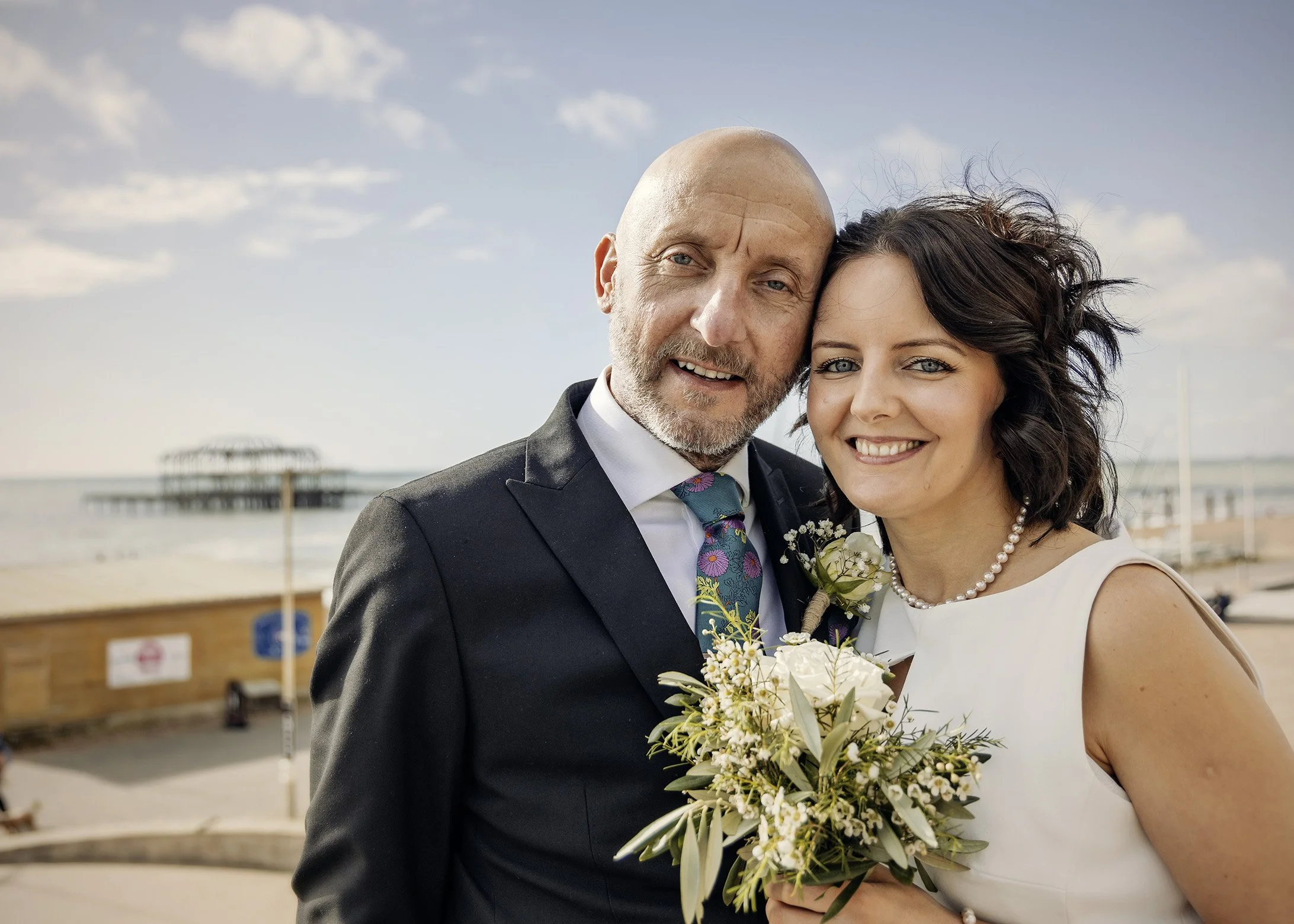 Candid relaxed and natural elopement photography on Brighton beach - East Sussex weddings
