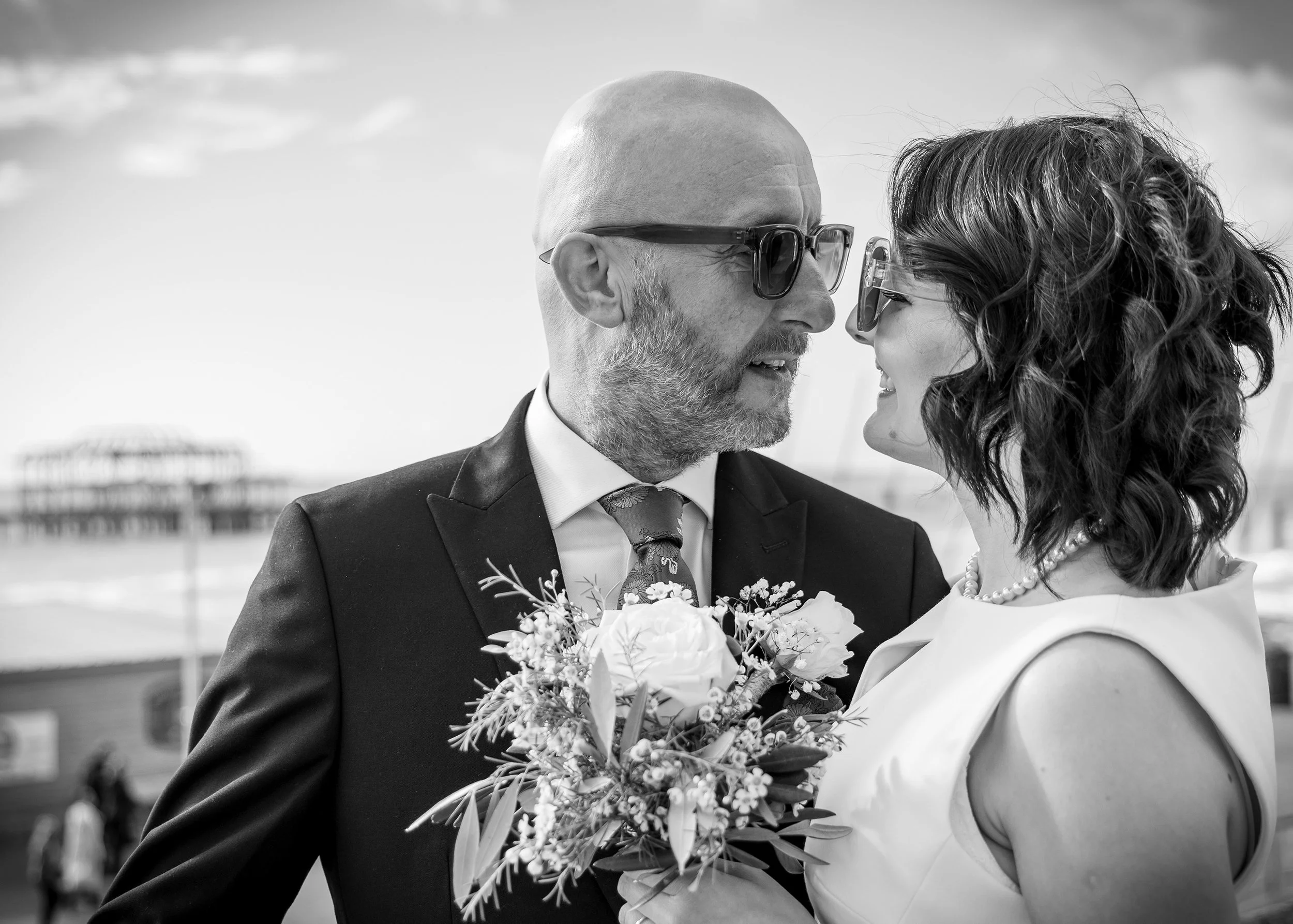 Candid relaxed and natural elopement photography on Brighton beach - East Sussex weddings