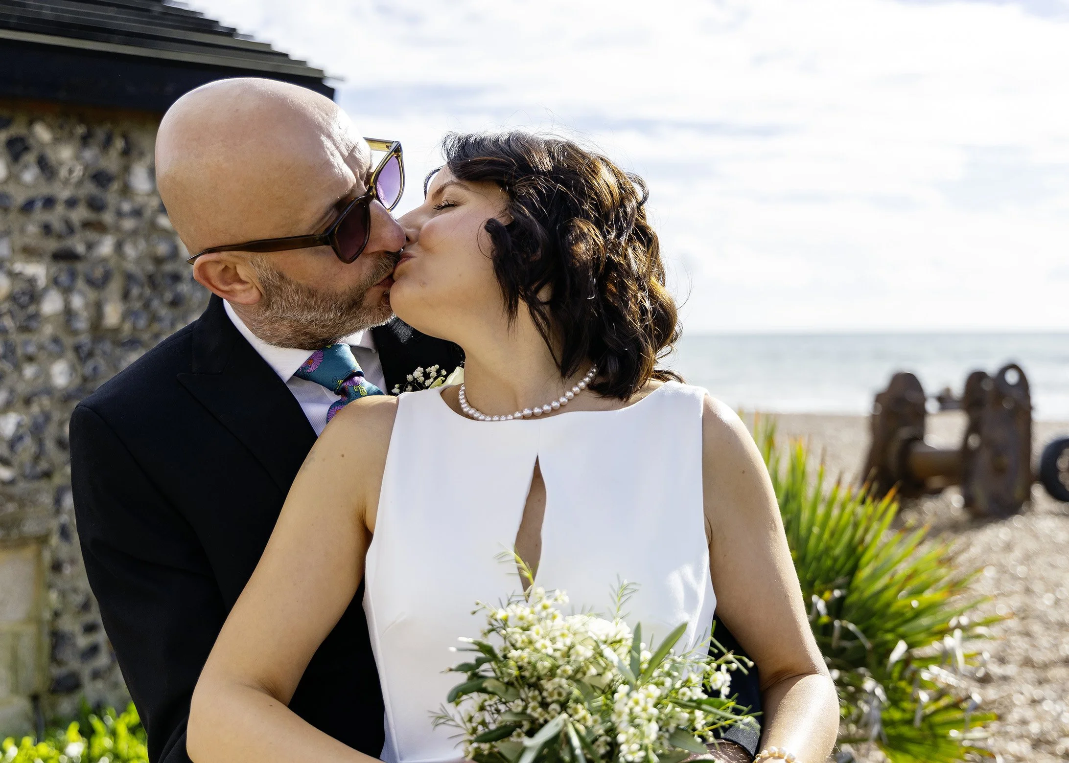 Candid relaxed and natural wedding portrait photography on Brighton beach - East Sussex weddings