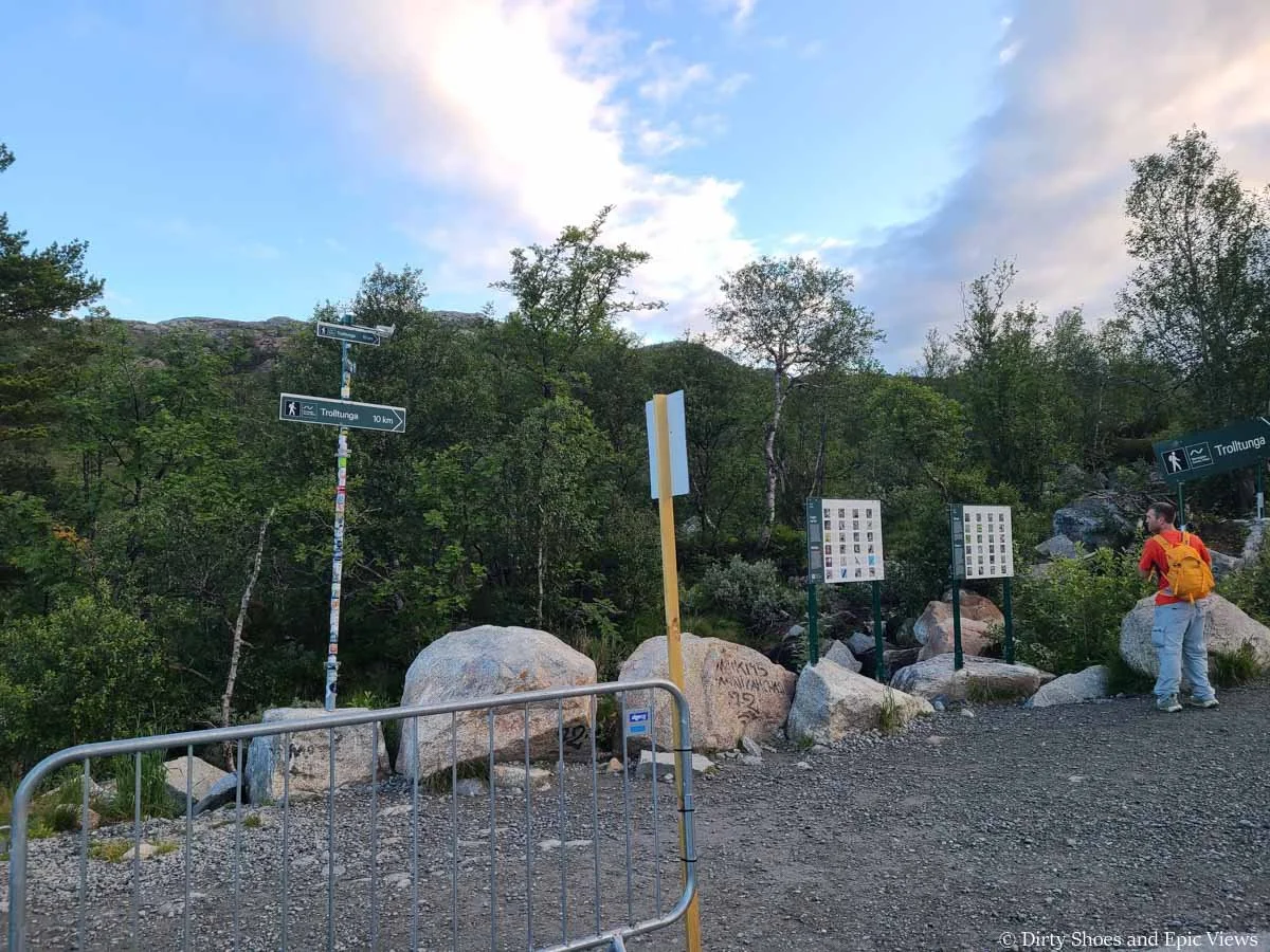 Signs marks the start of the Trolltunga trailhead in Norway