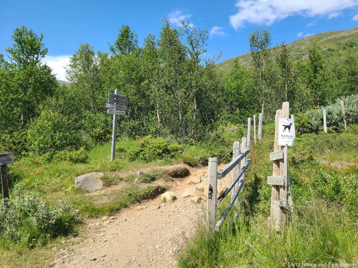 A trail sign marks the start of the Besseggen Ridge trail