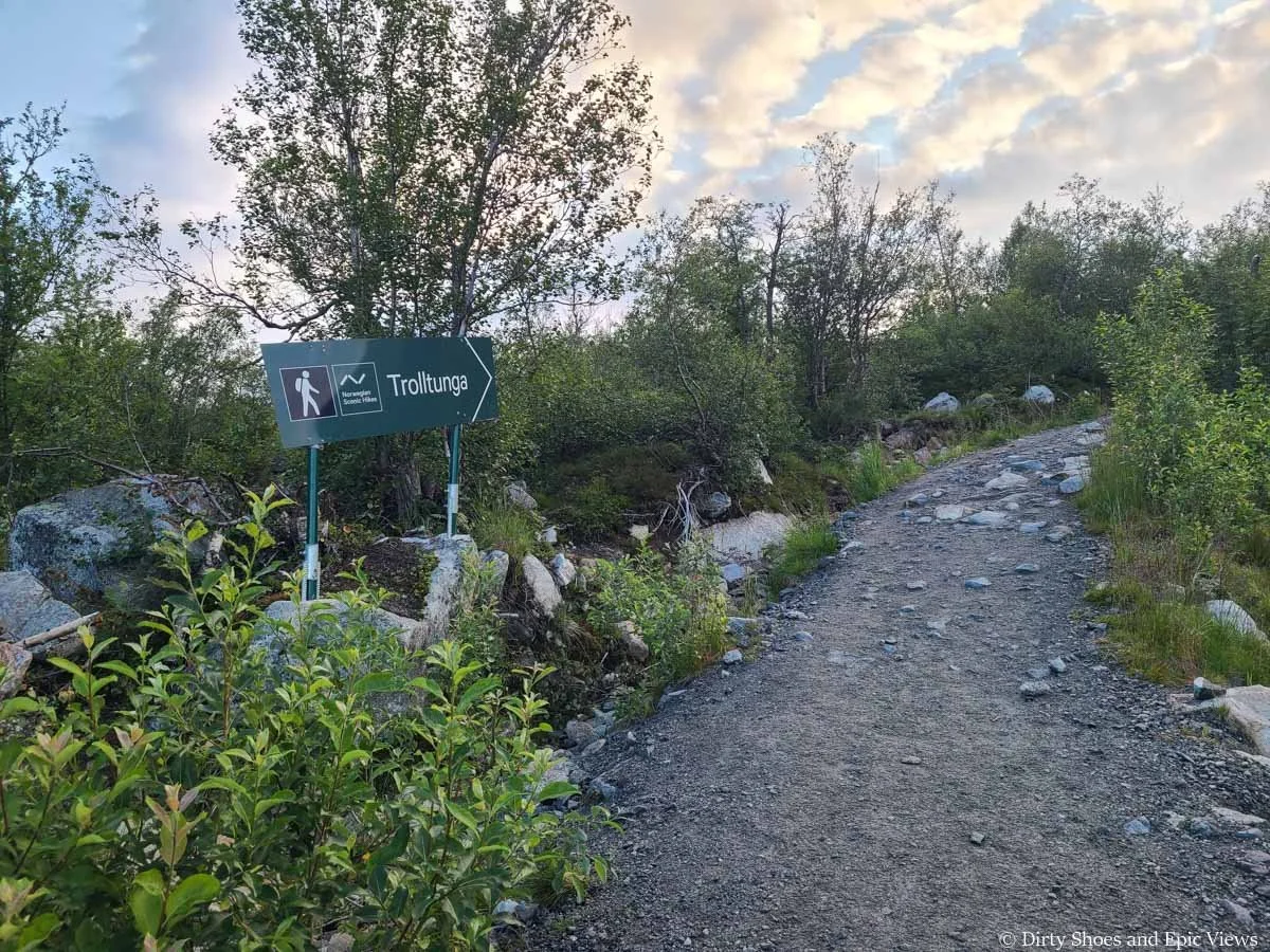 A sign marks the start of the Trolltunga trail in Norway