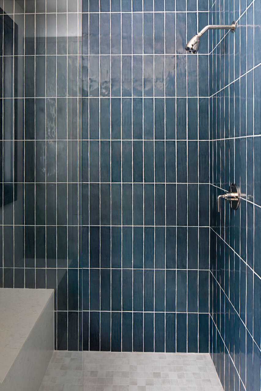 Blue stacked wall tile for showers