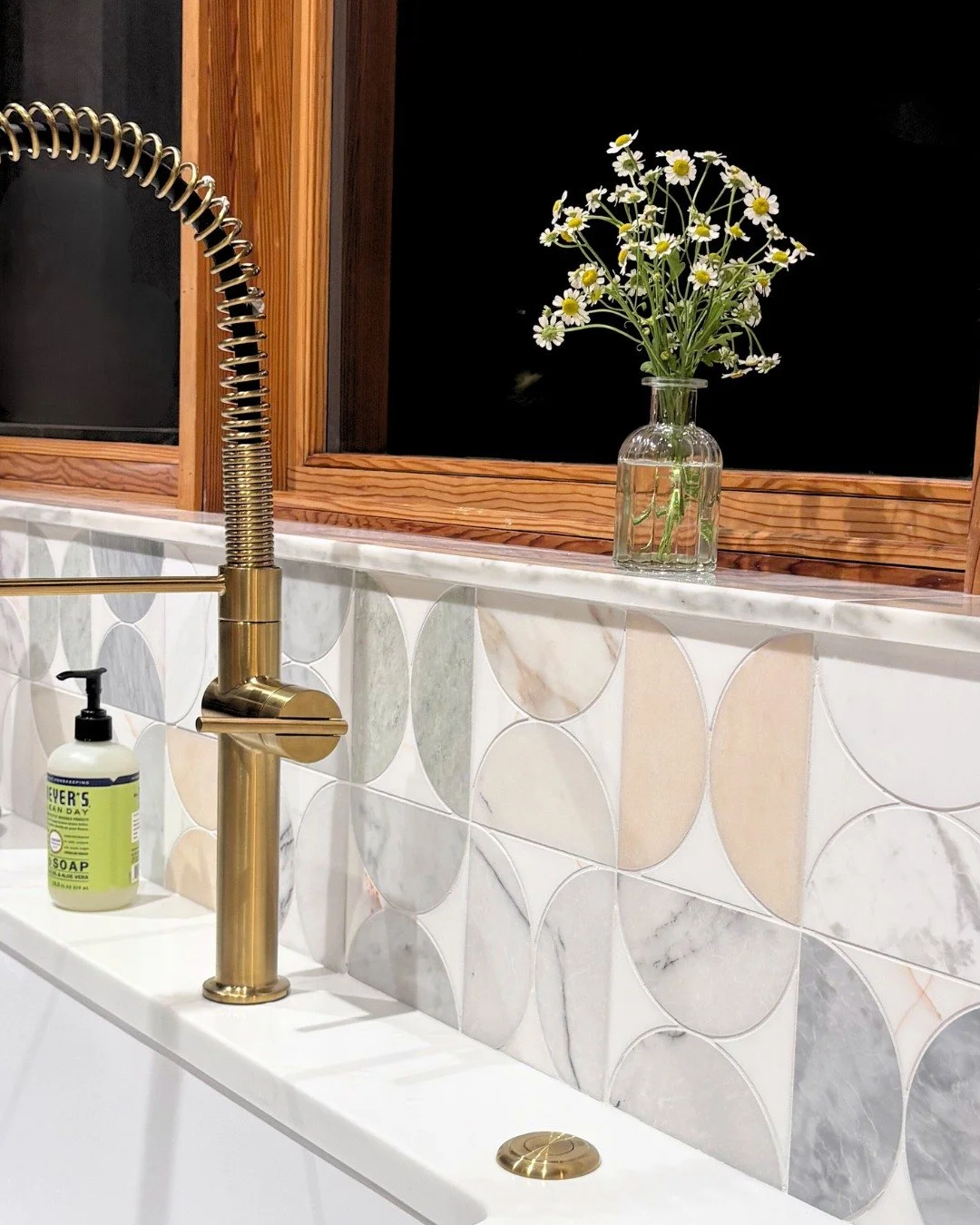 Natural material, organic pattern and a delicate, pastel color way. 

How perfect is this recent kitchen backsplash?