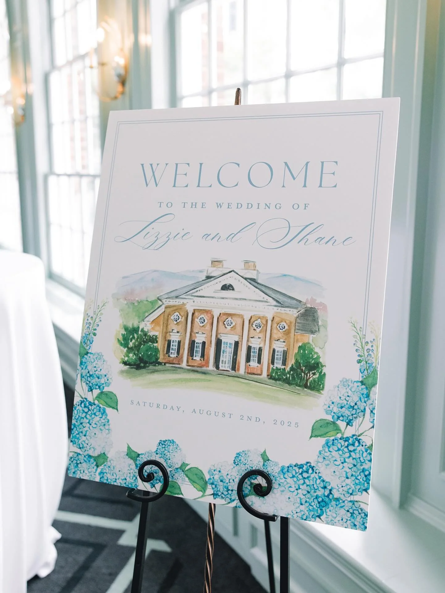 Lizzie &amp; Shane&rsquo;s welcome sign. Romantic, charming, and summery gorgeousness. 🩵