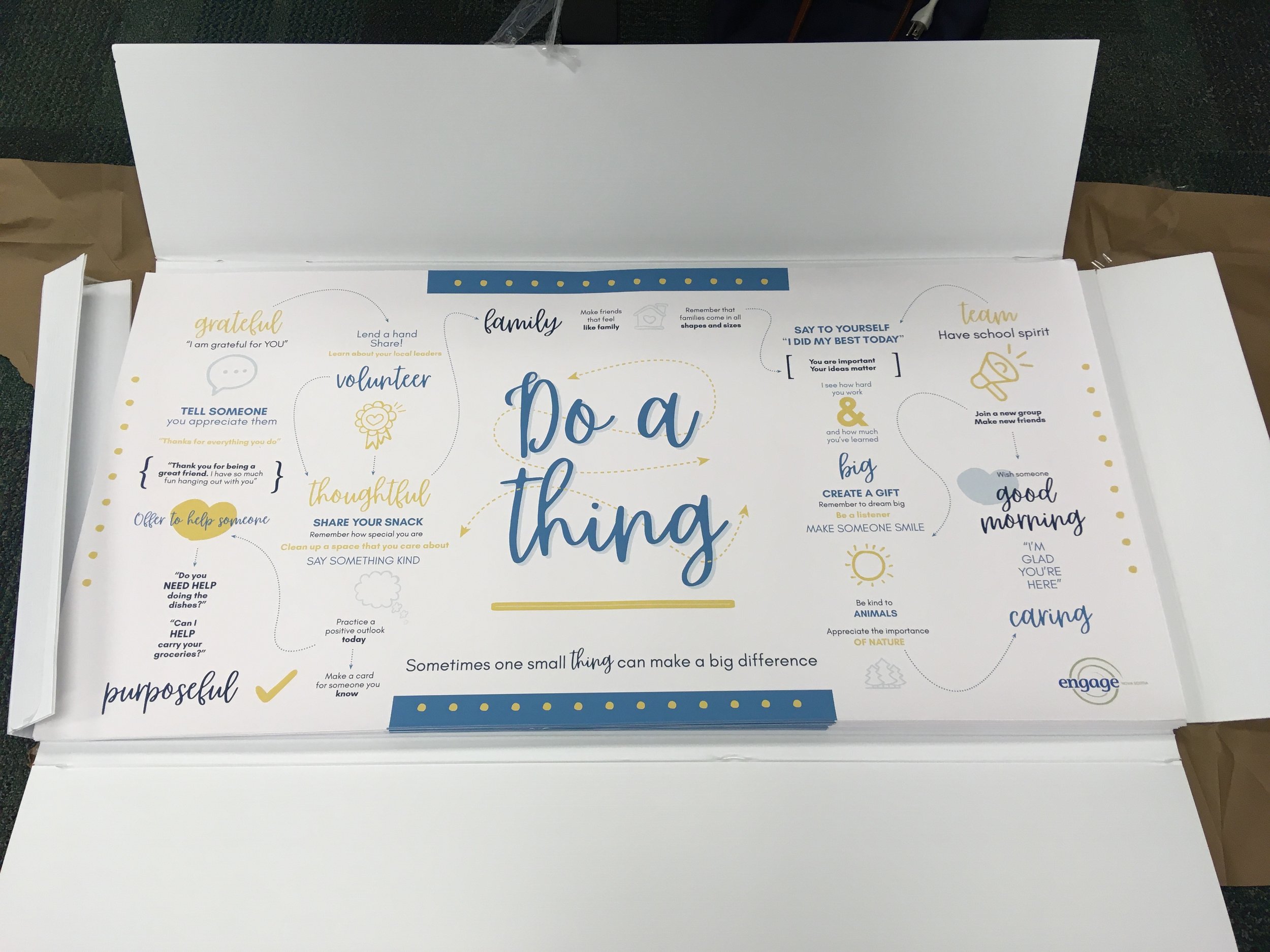 Engage NS - Do a ___ thing - Photo of 24x48 wall posters.JPG