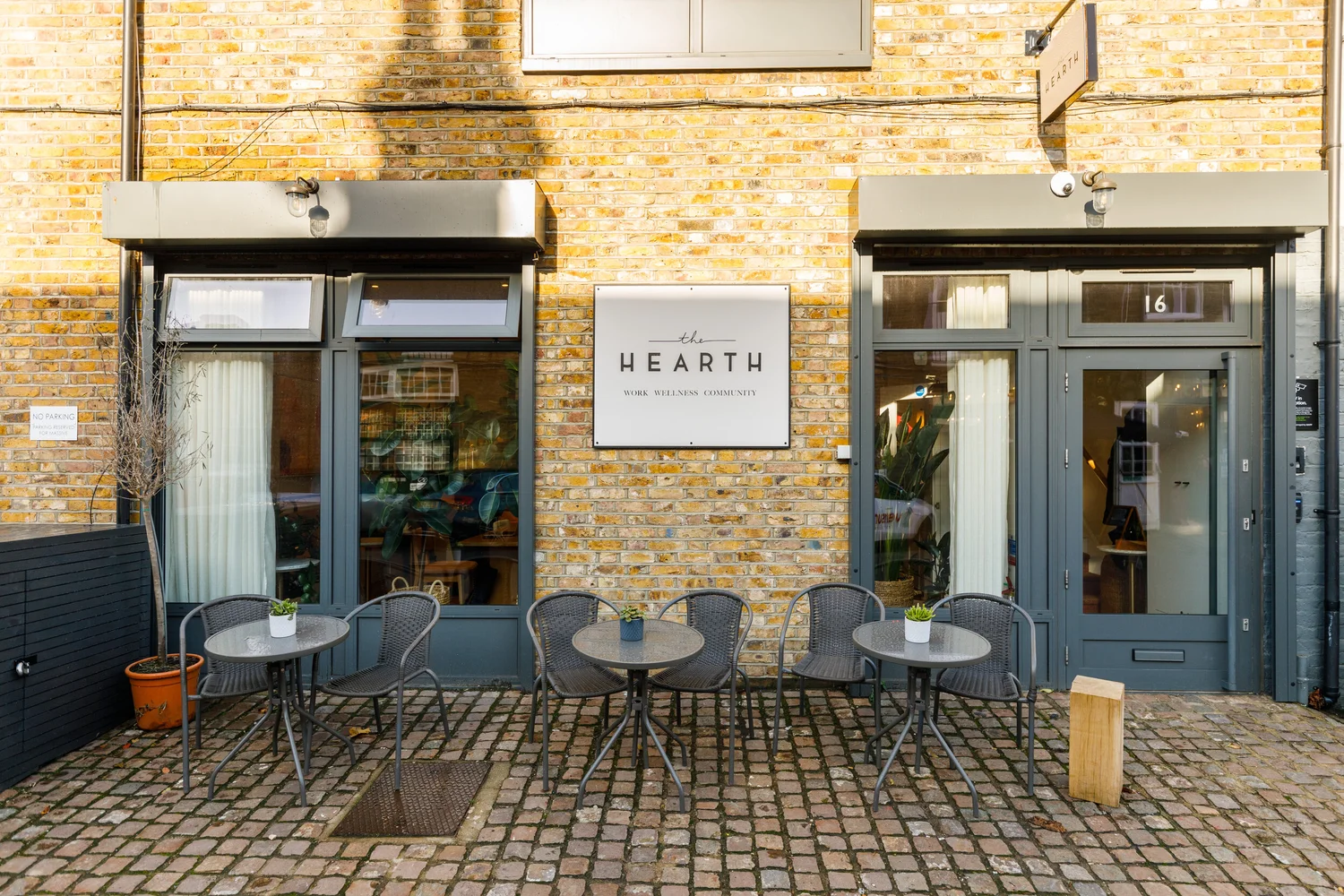 The Hearth’s exterior and outdoor seating on Lonsdale Road in Queen’s Park