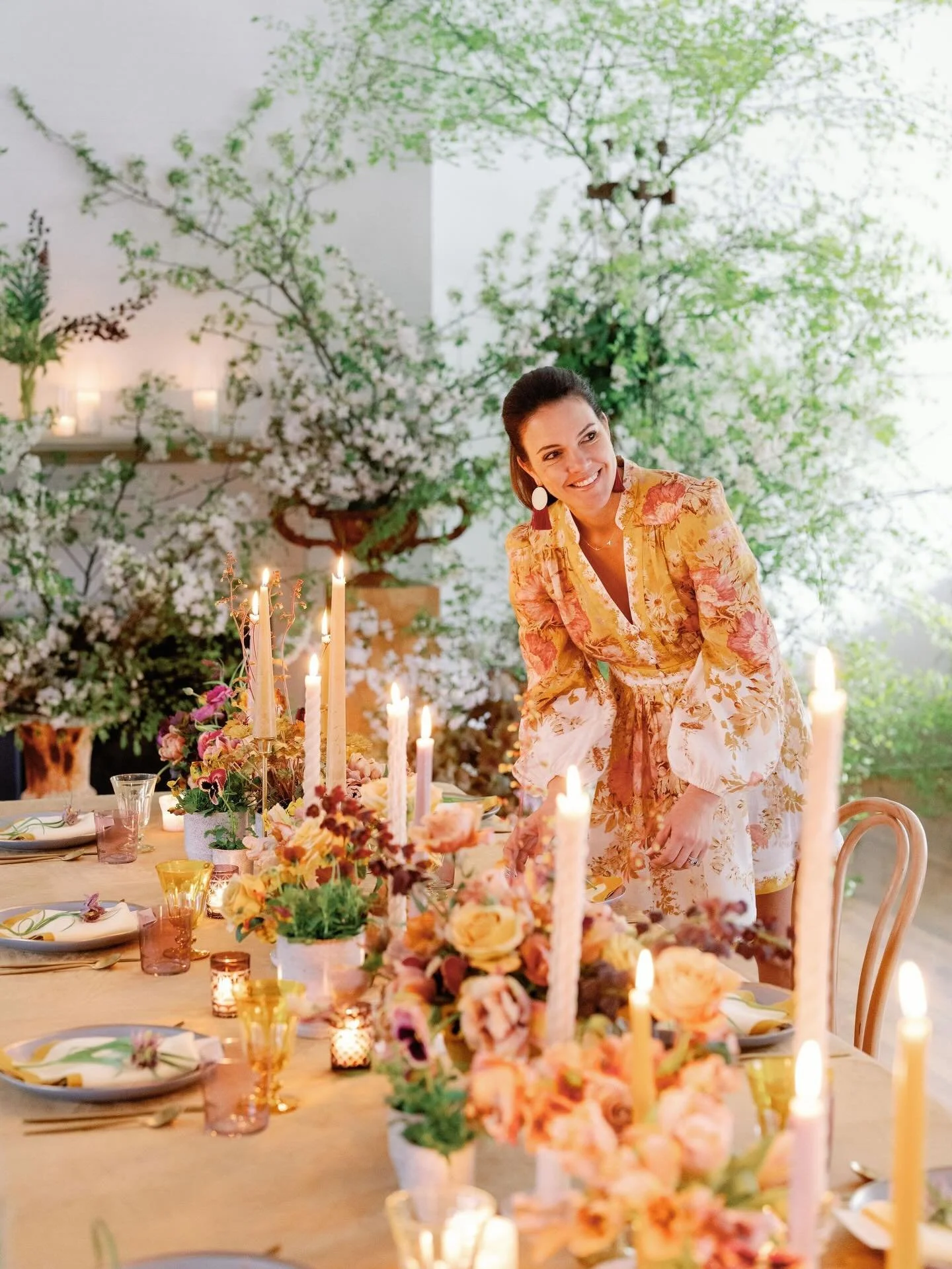 An annual study in composition.

Fringed tulips, garden roses, hellebore, and flowering branches arranged with movement in mind, nothing forced, nothing overworked. Low vessels to keep the table open. Linen with weight. Bentwood chairs pulled close. 