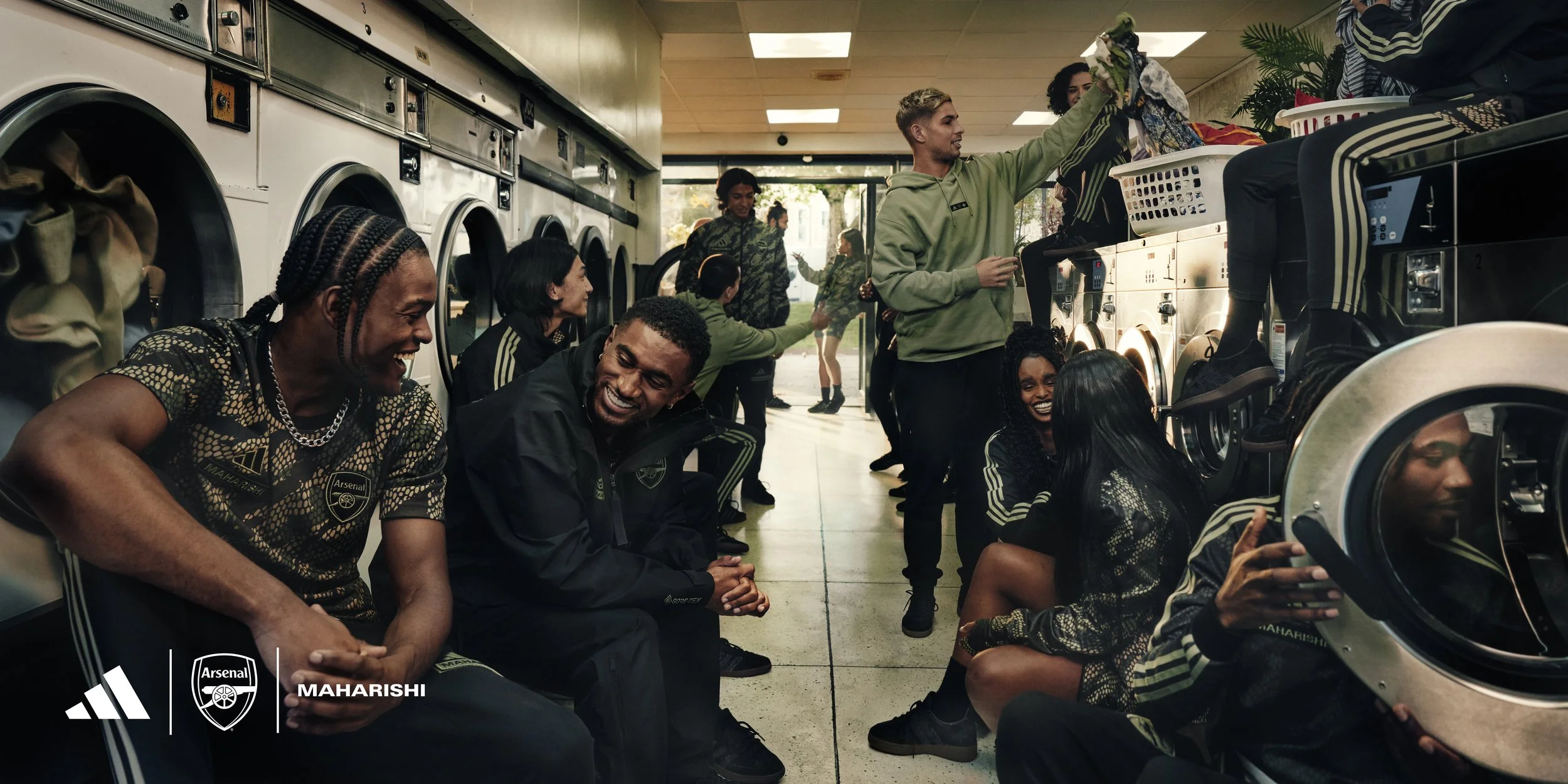 H23854_ARSENAL_FW23_MAHARISHI_CAGE_HERO_GROUP_0108_Lockup_2x1.jpg