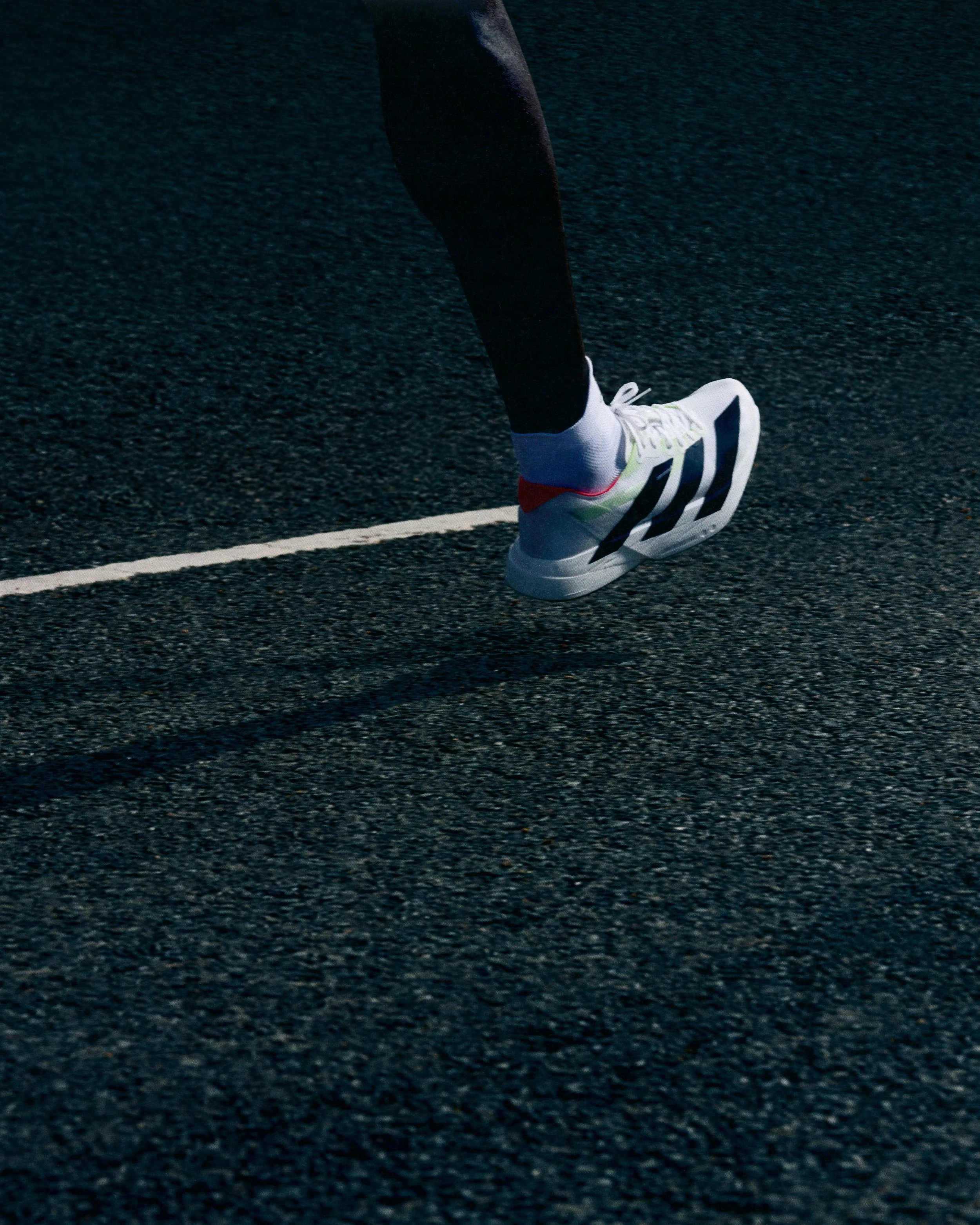 H24280_SS25_ADIZERO_PRO_4_ON_FOOT_05_4X5_RGB.jpg