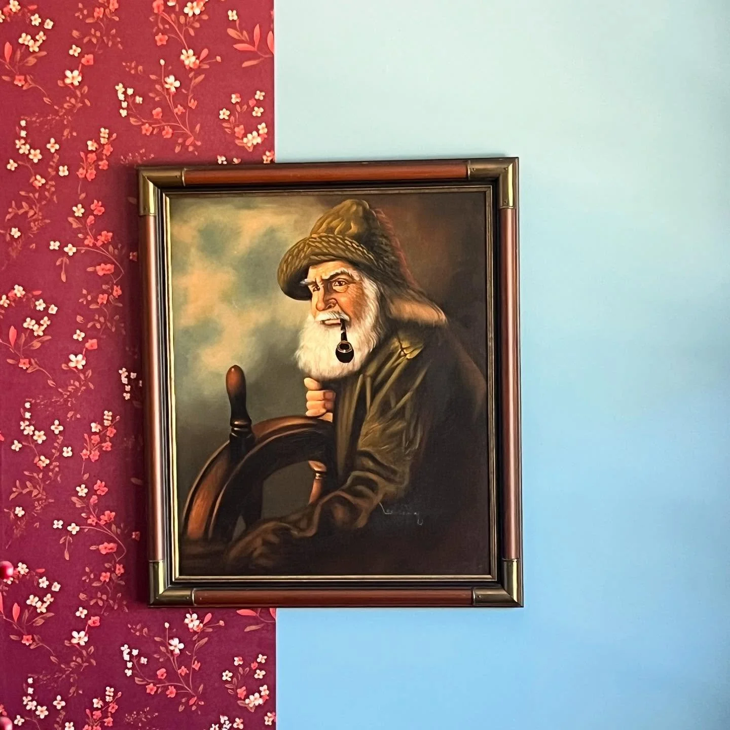 Decided this guy needed a new backdrop. Bye bye blue paint, hello floral wallpaper.