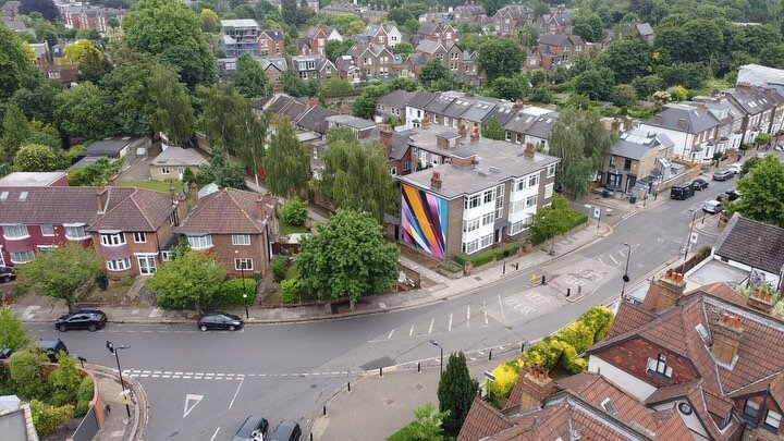 &lsquo;Relativity&rsquo; by @Remirough is now complete.
A big thank you to @fidelpix and the residents of Goldsmith House who gave us this wall; a perfect canvas for Remi&rsquo;s abstract painting. Thank you to @joefinmurphy for this aerial footage t