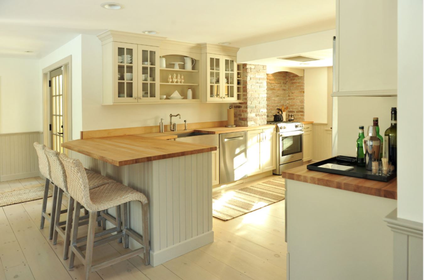 rustic kitchen renovation with peninsula and stools