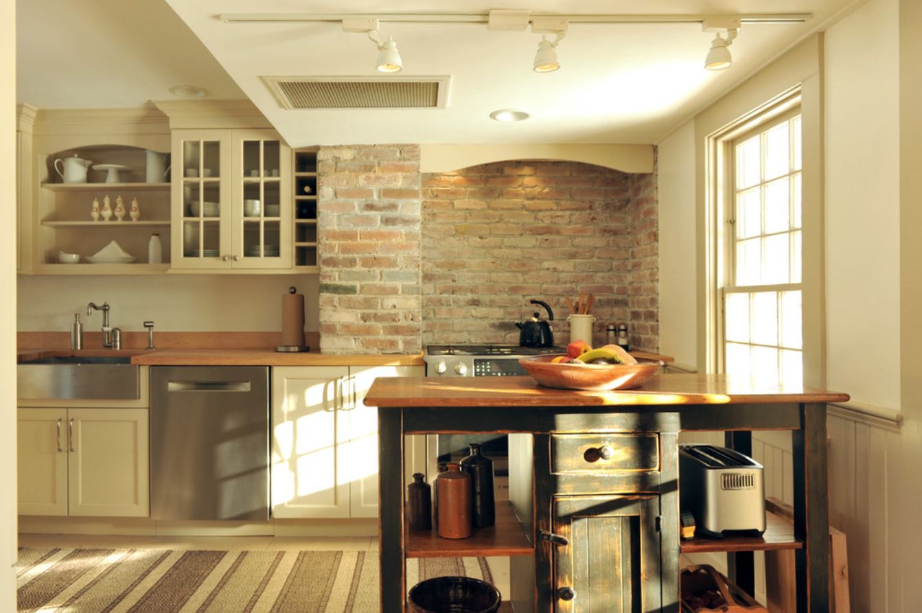 kitchen renovation with brick detail and wood counter top