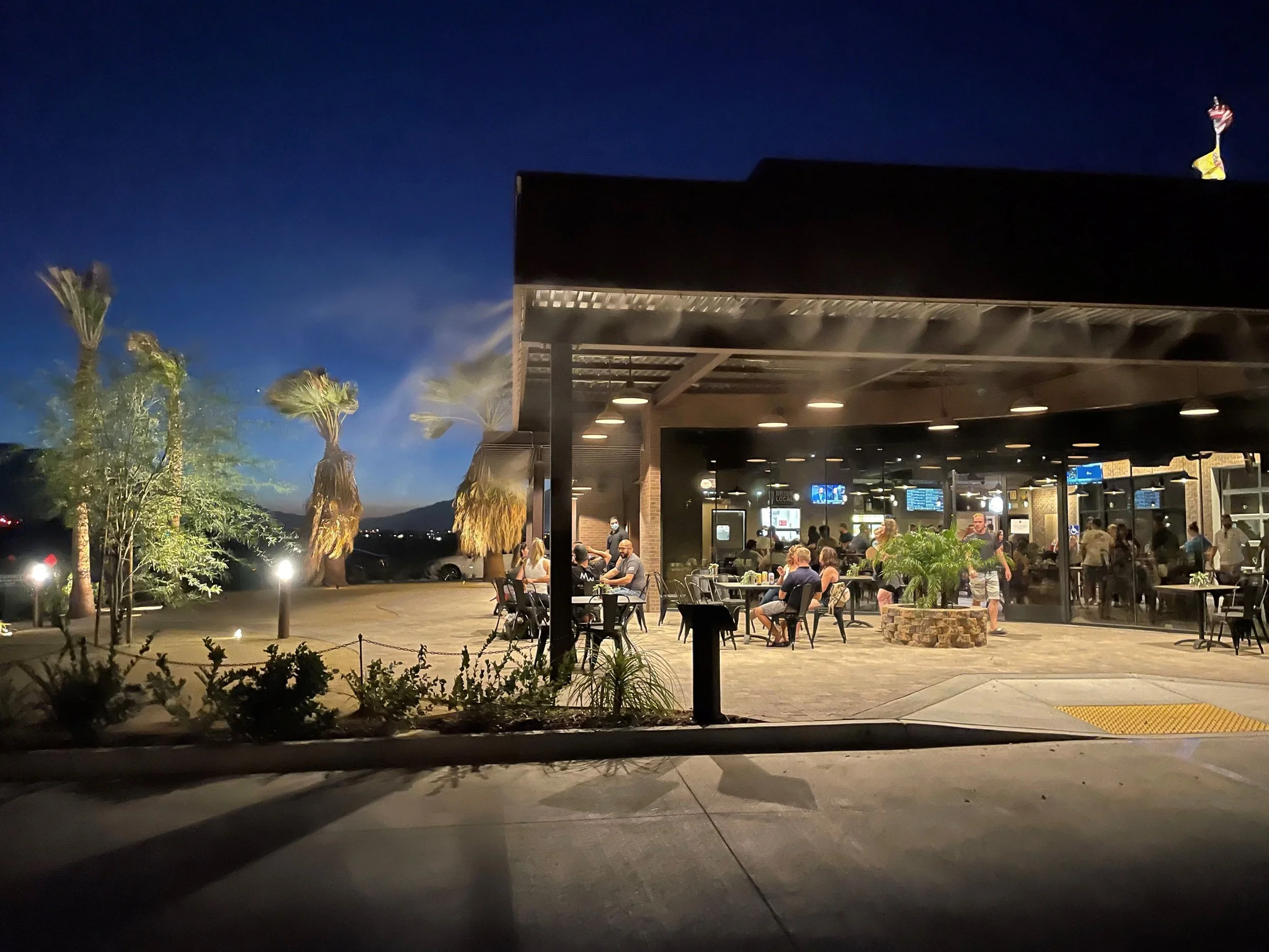 Outside Patio area of La Quinta Brewing Co, hosts of the 2026 Bosoms & Brews Fest, in Palm Desert, California.