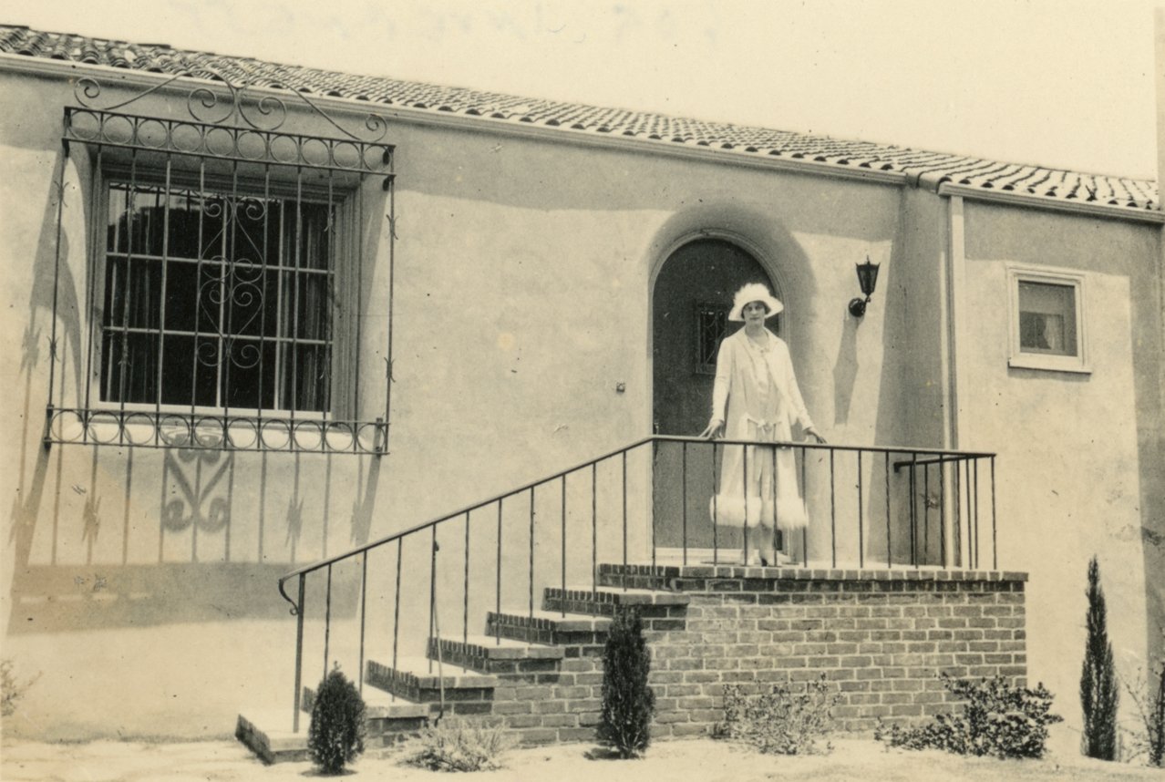 609 Inverness Drive with Mrs. Augusta Rush at front door, c. 1924