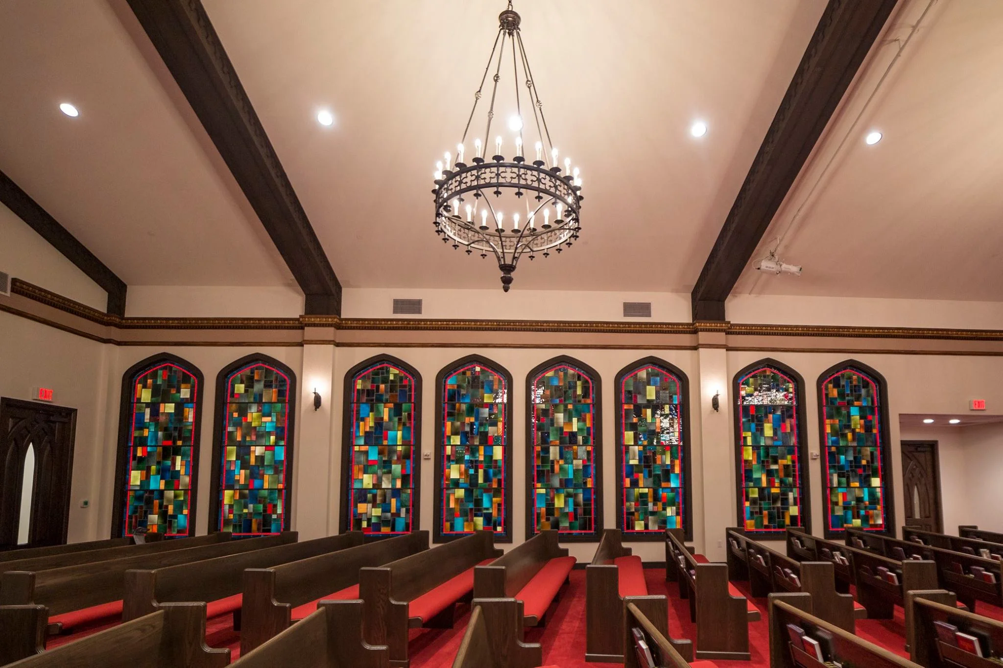 Stained glass windows that were moved from the old building.